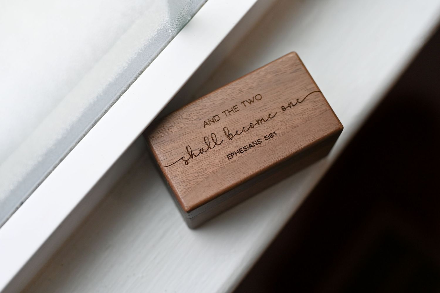 Engraved wooden ring box with Ephesians 5:31 scripture quote, perfect for wedding proposals and ring storage.