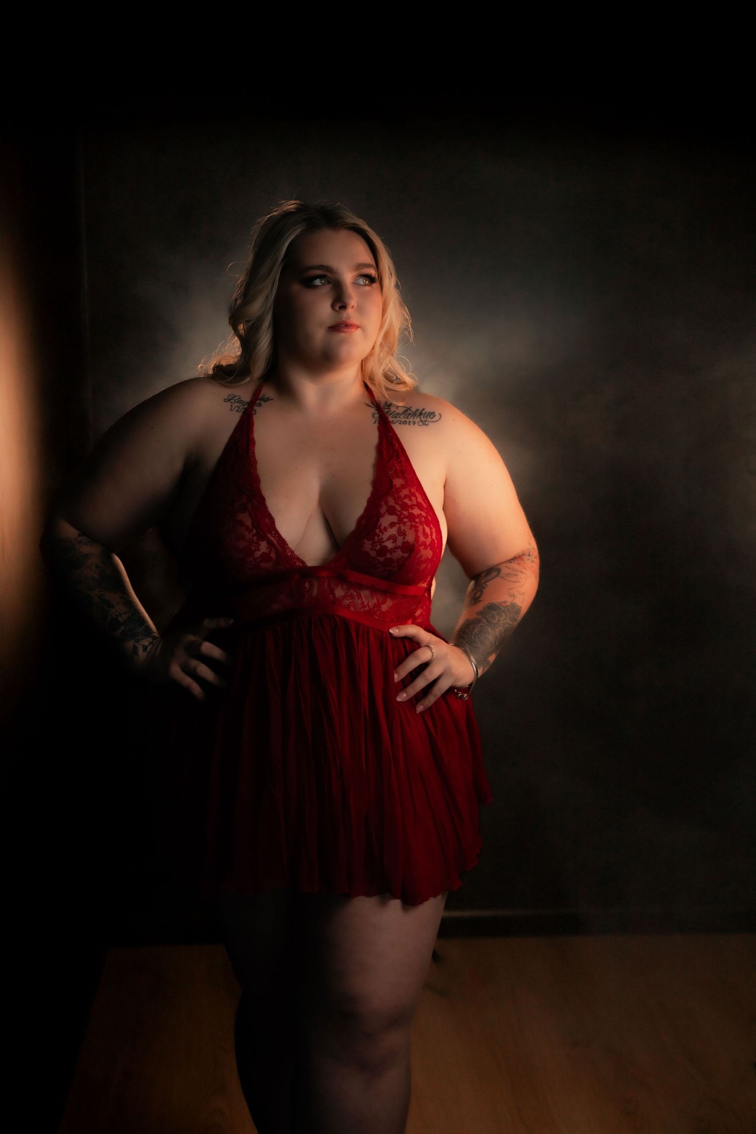 Rain room boudoir photography focused on empowerment, body confidence, and natural beauty, celebrating real bodies with minimal retouching a