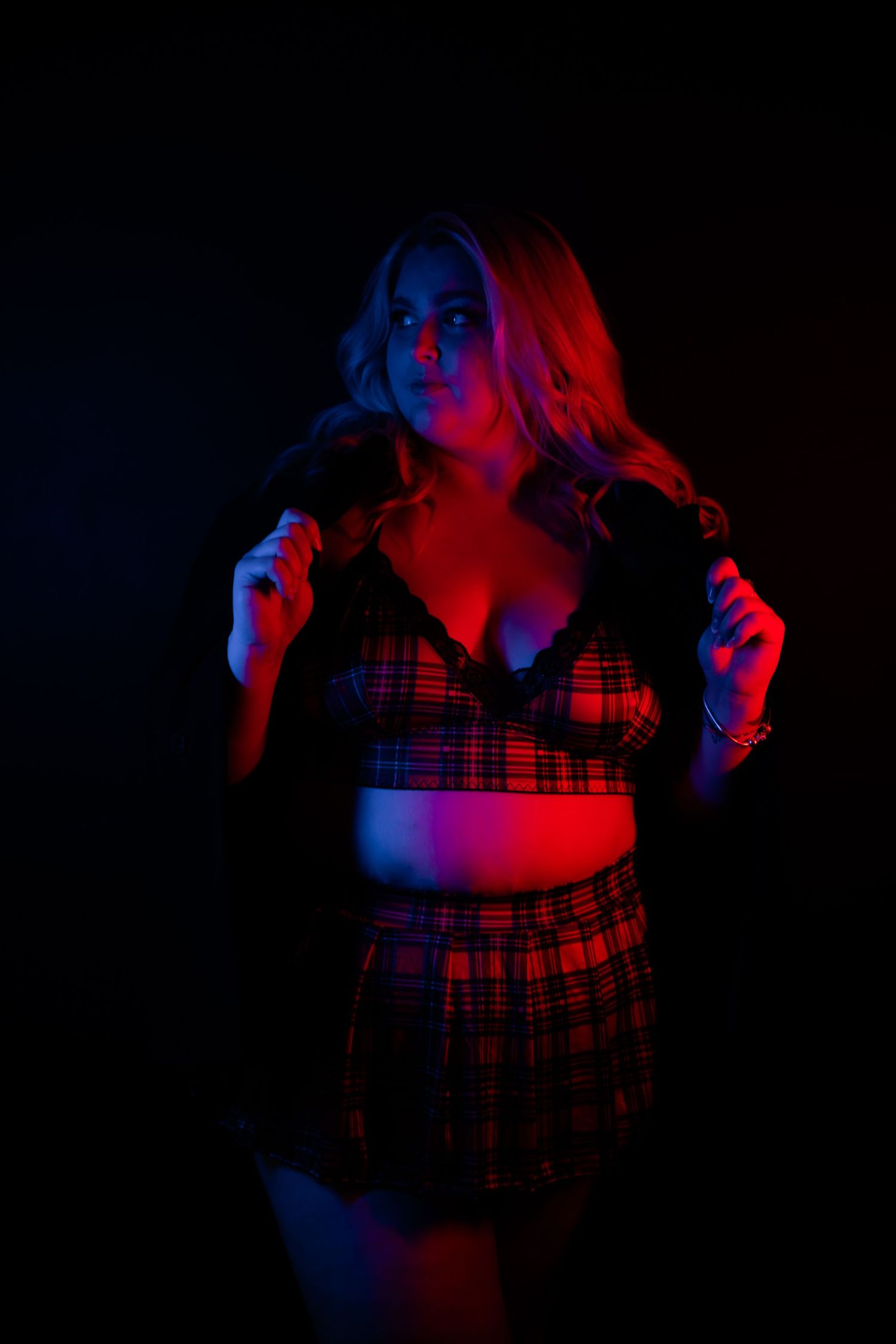 contrast to the max photo strong and bold woman in lingerie powerful red and blue lights