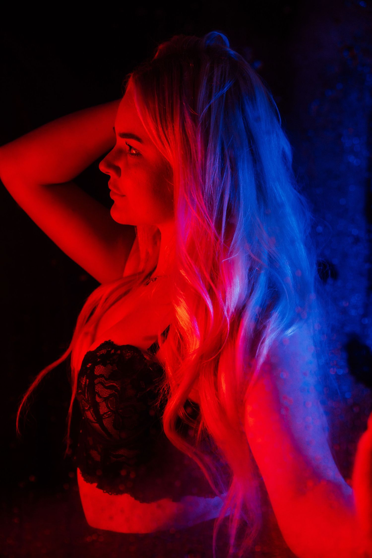 Rain room boudoir photography focused on empowerment, body confidence, and natural beauty, celebrating real bodies with minimal retouching a