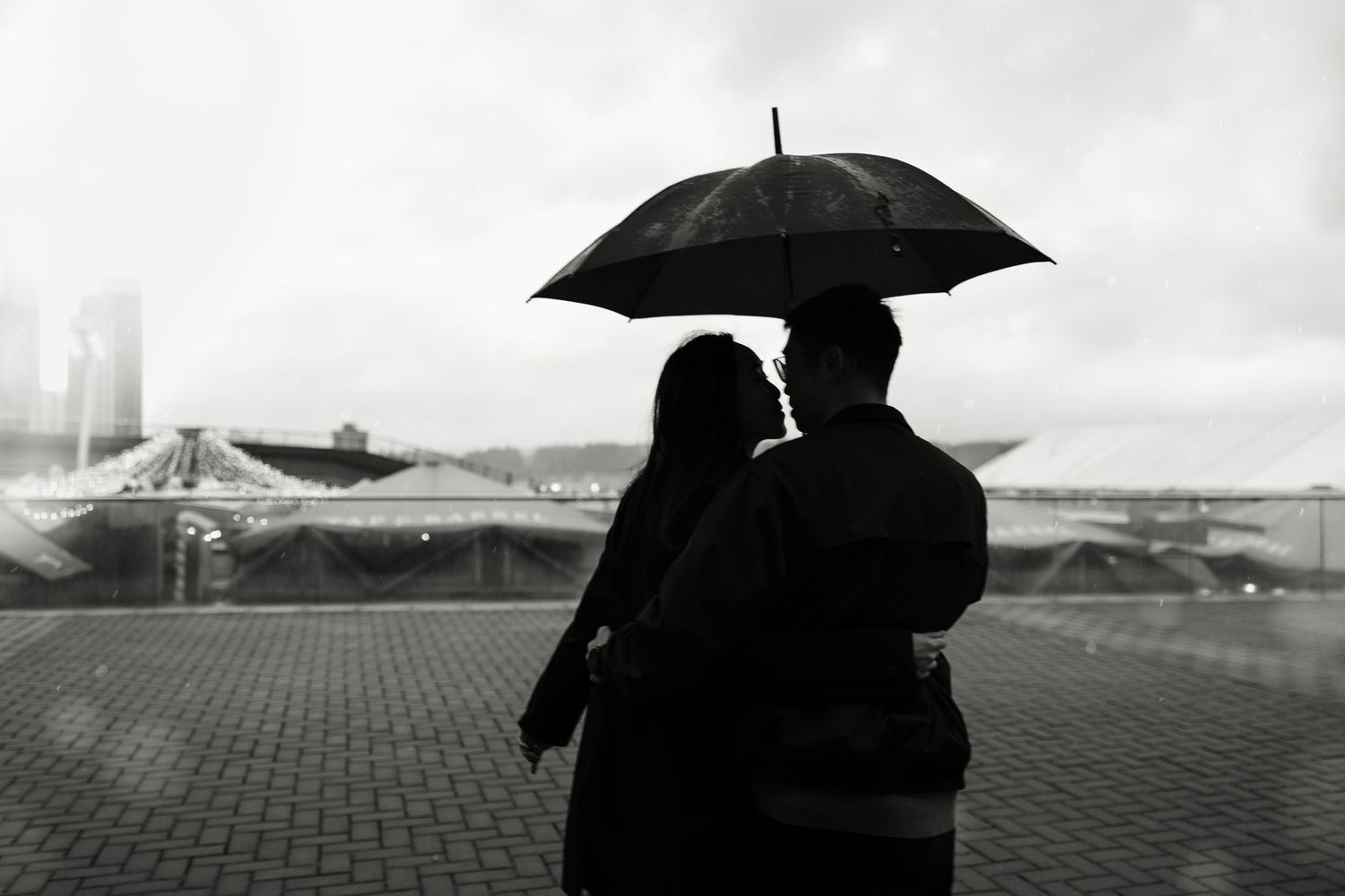 rainy day couples session, rain photography, umbrella love story, downtown Vancouver rainy couples session, umbrella photography, proposal