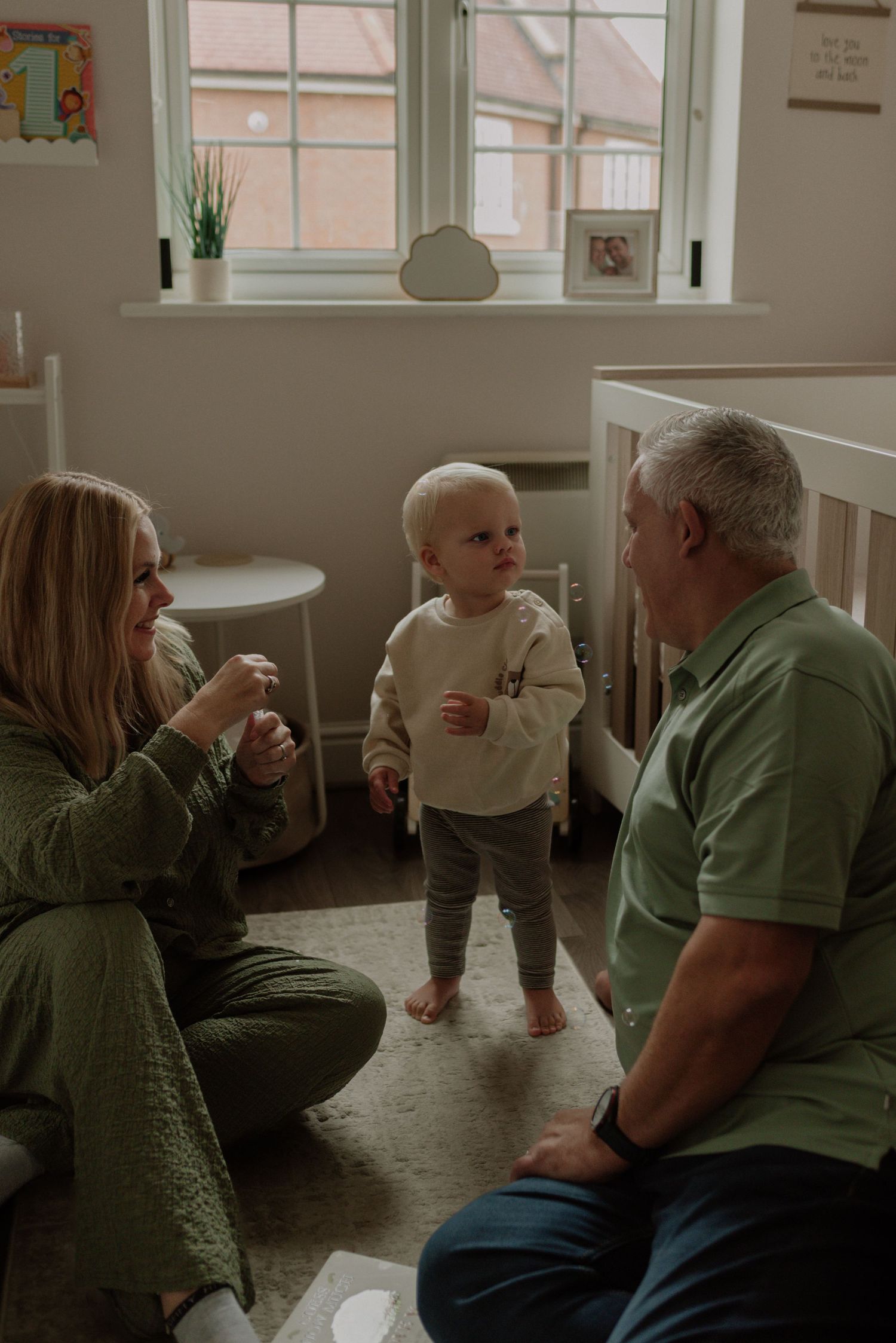 A heartwarming multi-panel photo sequence showing three generations of family members sharing tender moments together.