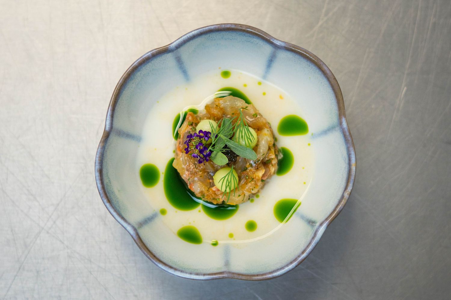 Langoustine Tartare with a Horseradish and Butter Milk Sauce split with Dill Oil, Pickled Cucumber Balls