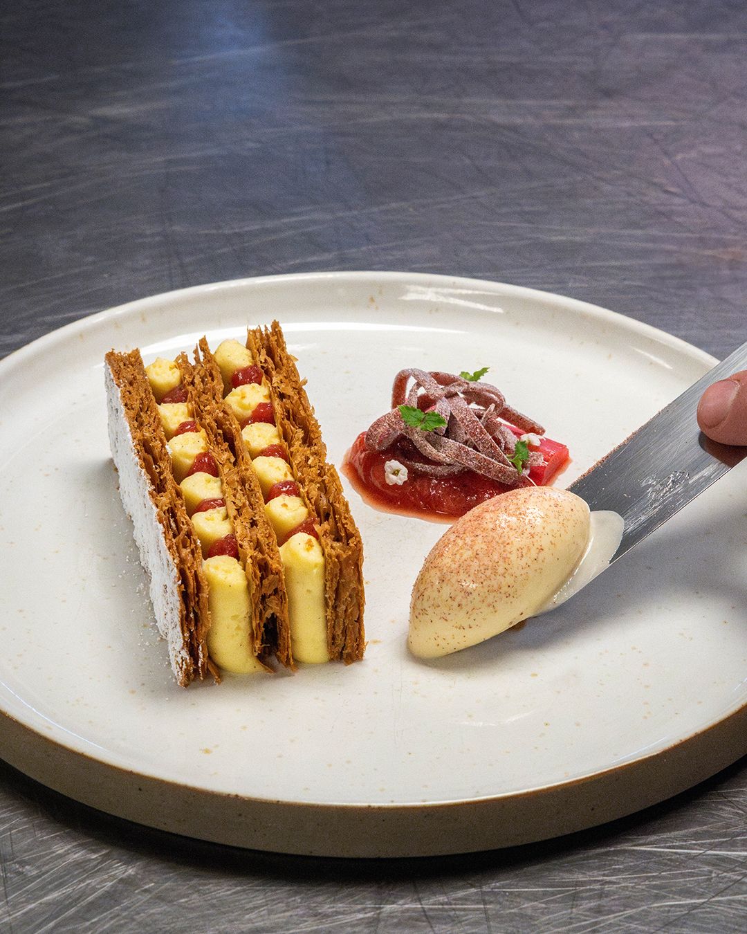 Mille Feuille, Citrus Crémeux, Rhubarb Compote, Poached Rhubarb, Toasted Almond & Vanilla Ice Cream topped with Crytallised Almonds