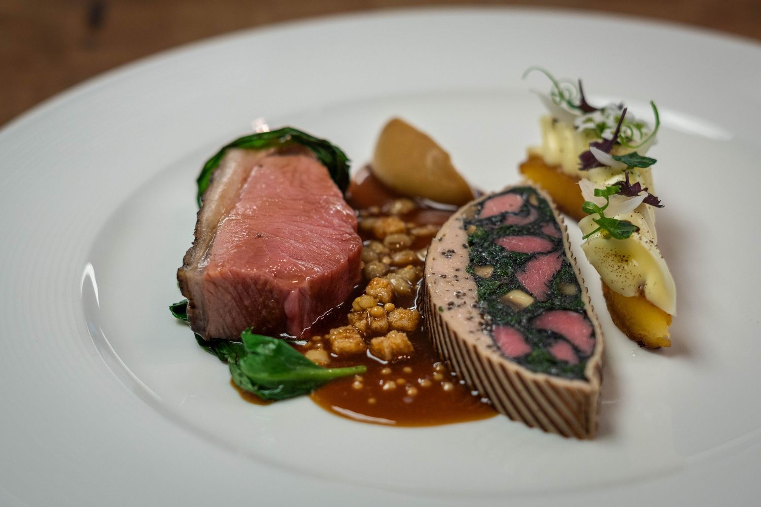 BBQ Scotch lamb short saddle with haggis style spices
Mini fillet & wild garlic farce