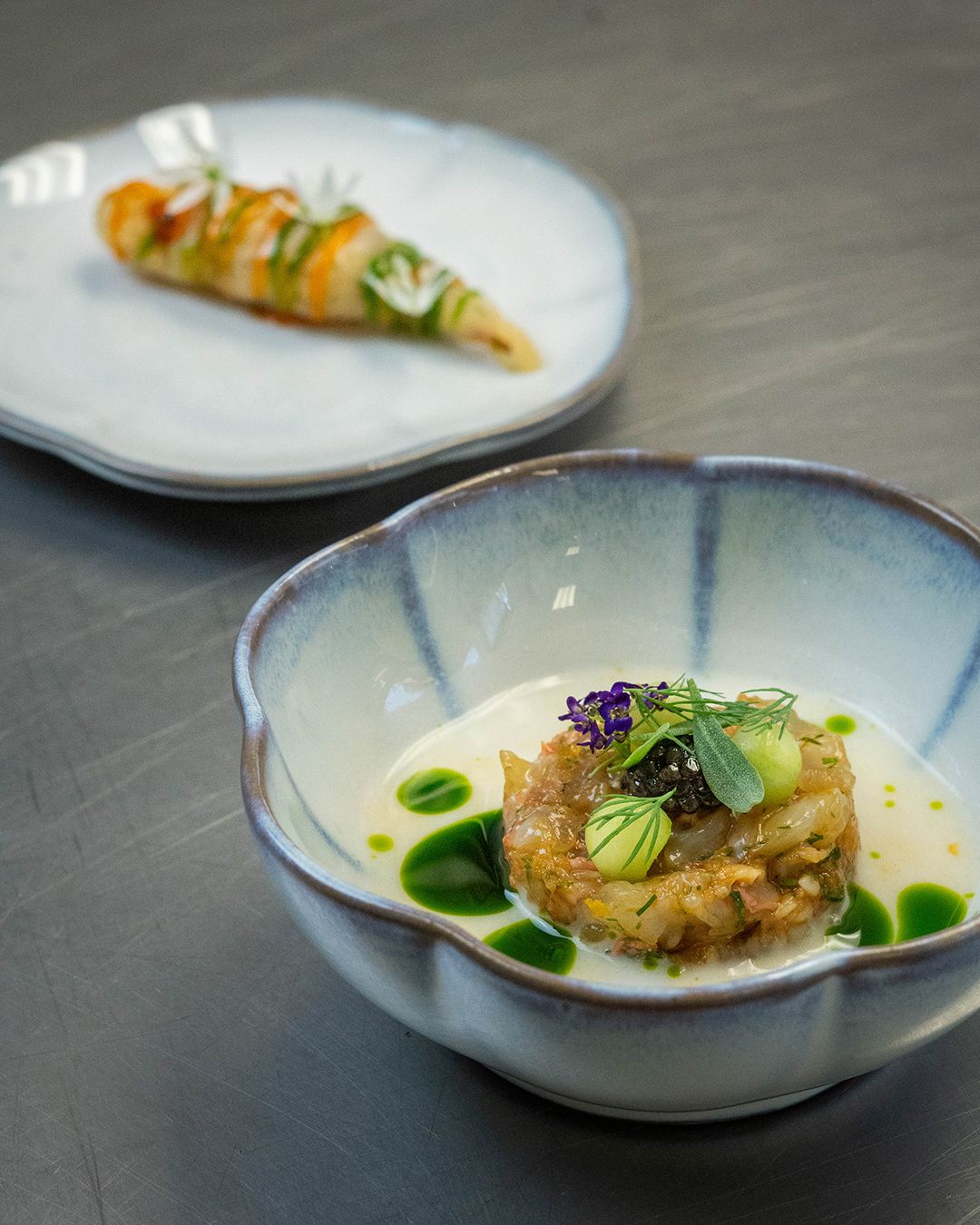 Langoustine Tartare with a Horseradish and Butter Milk Sauce split with Dill Oil, Pickled Cucumber Balls
