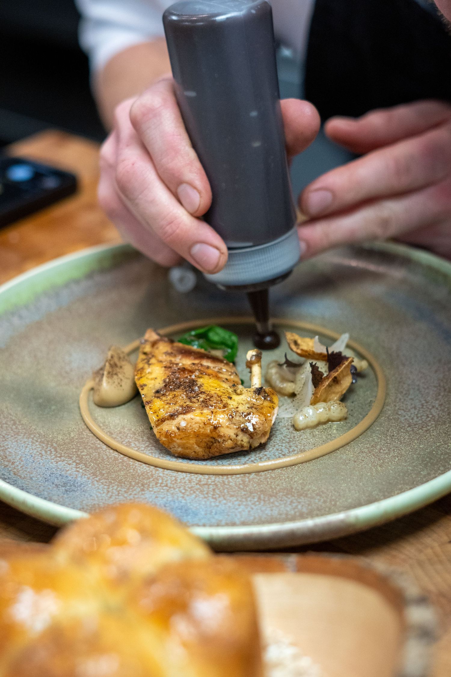 Partridge dish being plated