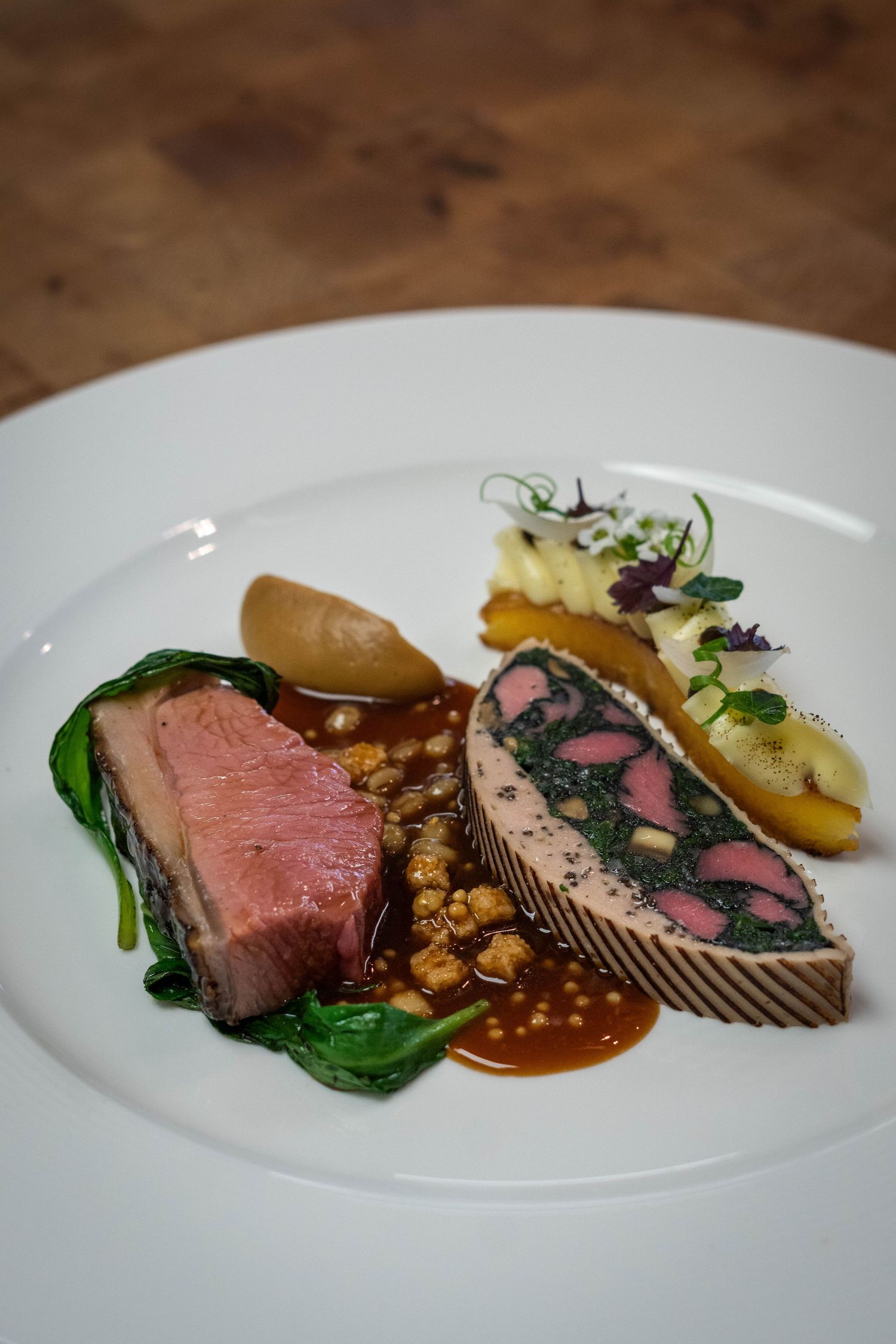 BBQ Scotch lamb short saddle with haggis style spices
Mini fillet & wild garlic farce