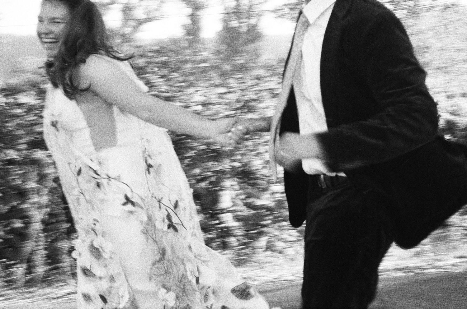 Romantic outdoor wedding photos with water reflections in the background. Photographed on film in the North Bay