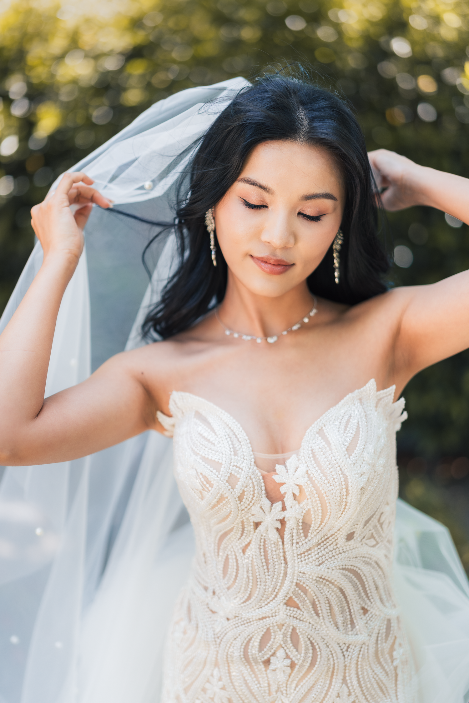 Close-up details of an elegant lace wedding dress with intricate patterns at Carneros Resort and Spa in Sonoma County.