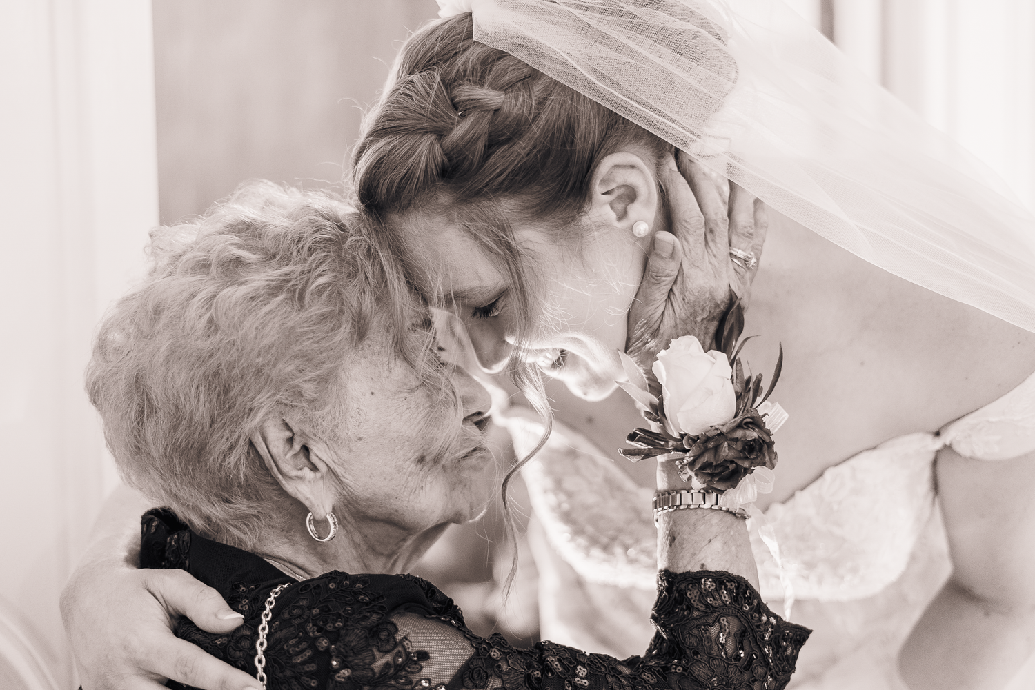 Timeless black and white photo of a bride and her grandma.