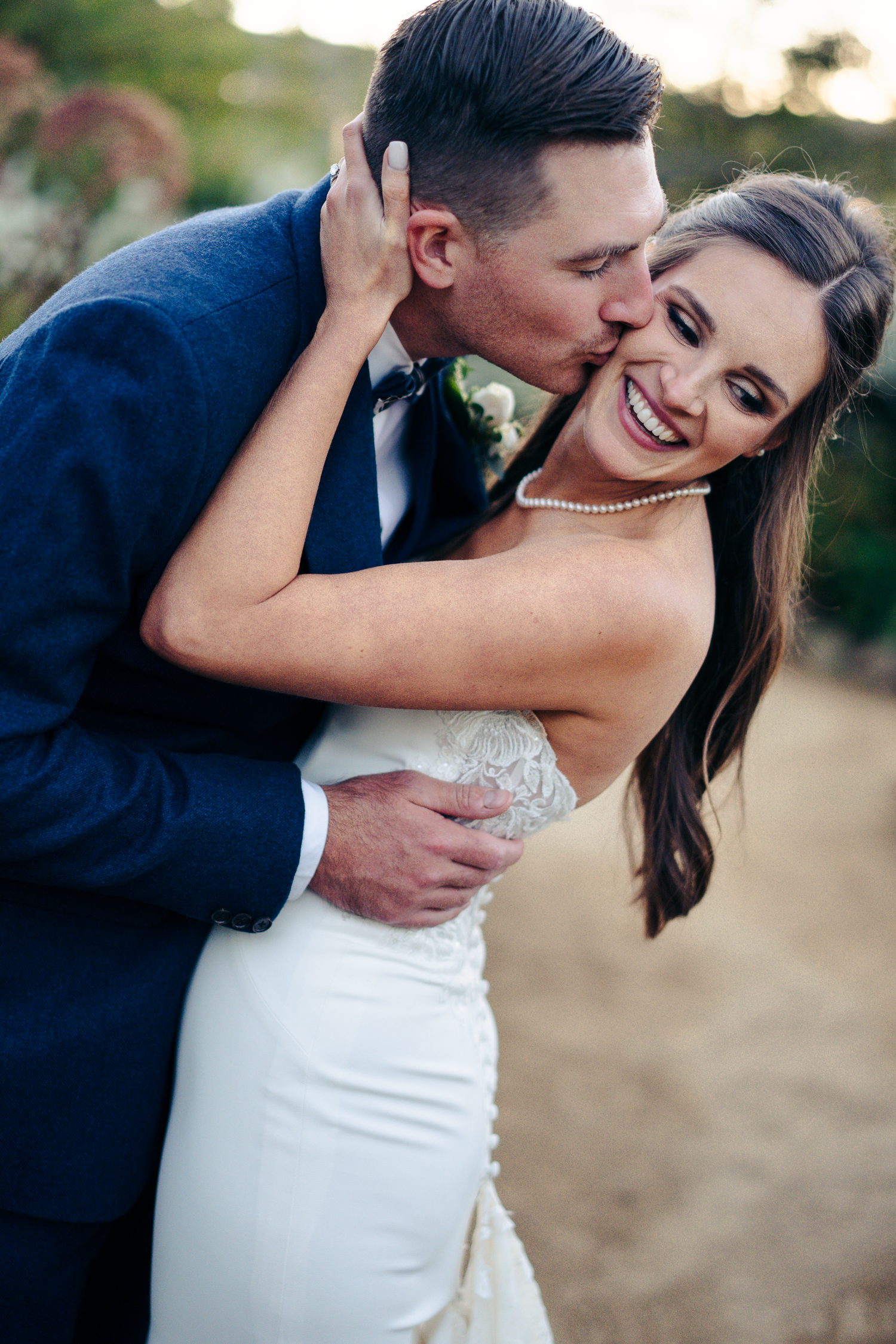 Intimate wedding moment captured outdoors with soft natural lighting at Cornerstone Sonoma.