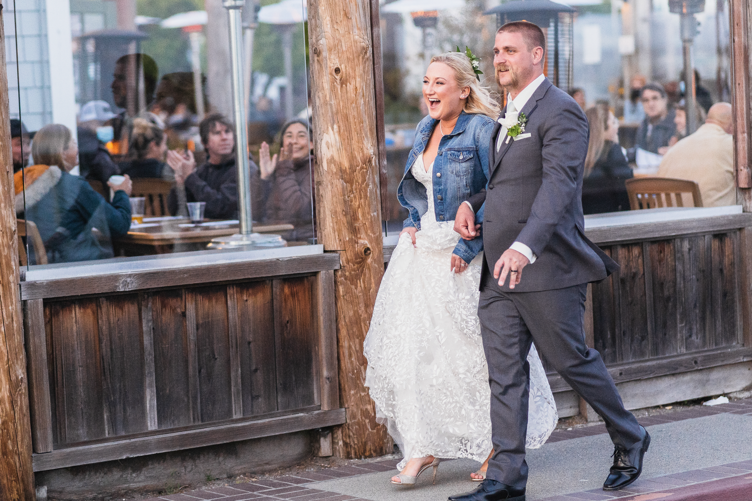 Bride and Groom walking through Half Moon Bay.