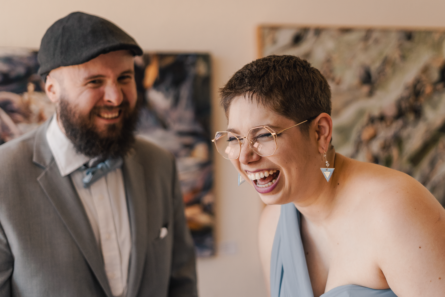 Candid reactions and laughter during wedding preparations.