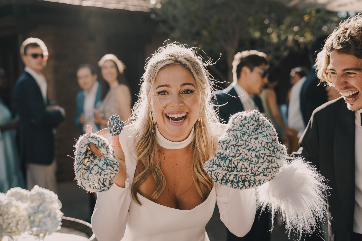 Joyful wedding celebration moments captured in natural sunlight.