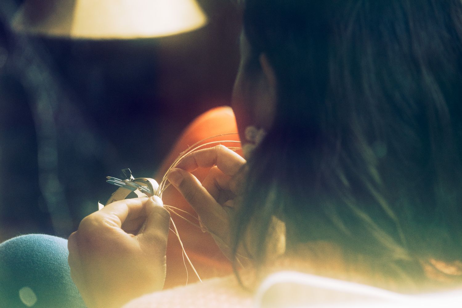 Artistic close-up photograph with warm lighting and soft focus effects.