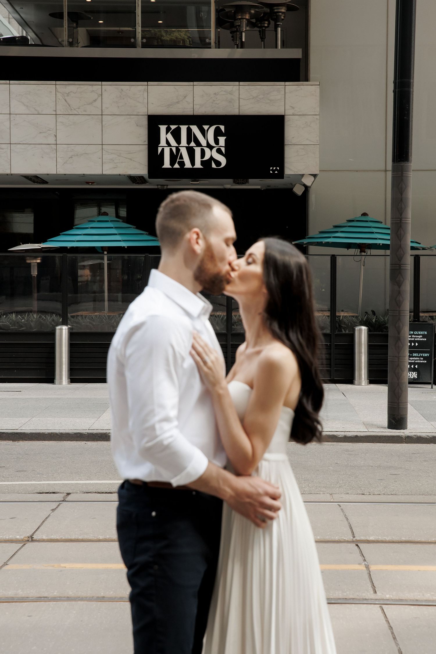 Engagement photos in downtown Toronto, but make it sentimental. Jamie and Brandon met each other at King Taps.