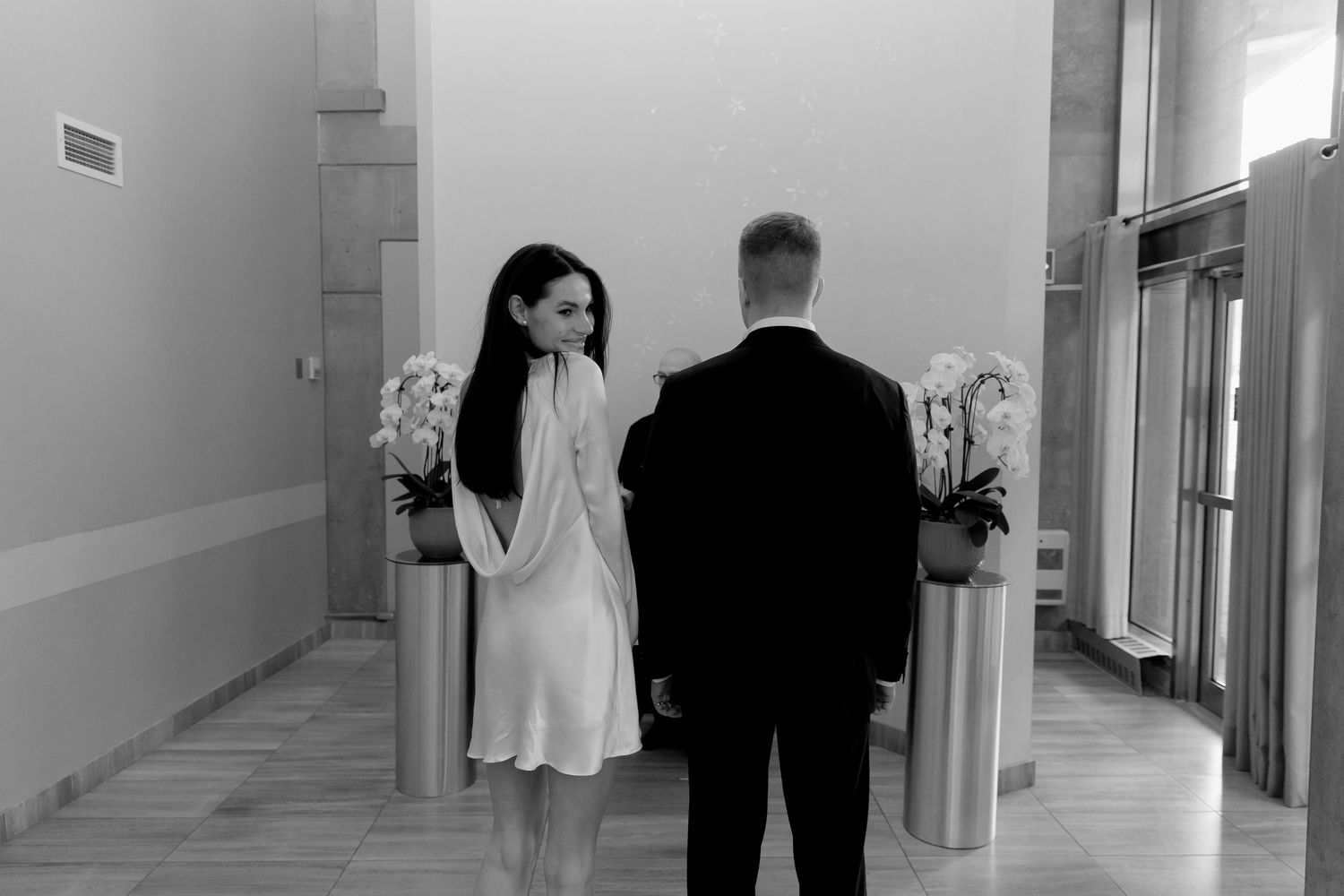 Vintage and editorial style civil wedding photos in Toronto, Ontario at Toronto City Hall. Canadian wedding photographer.