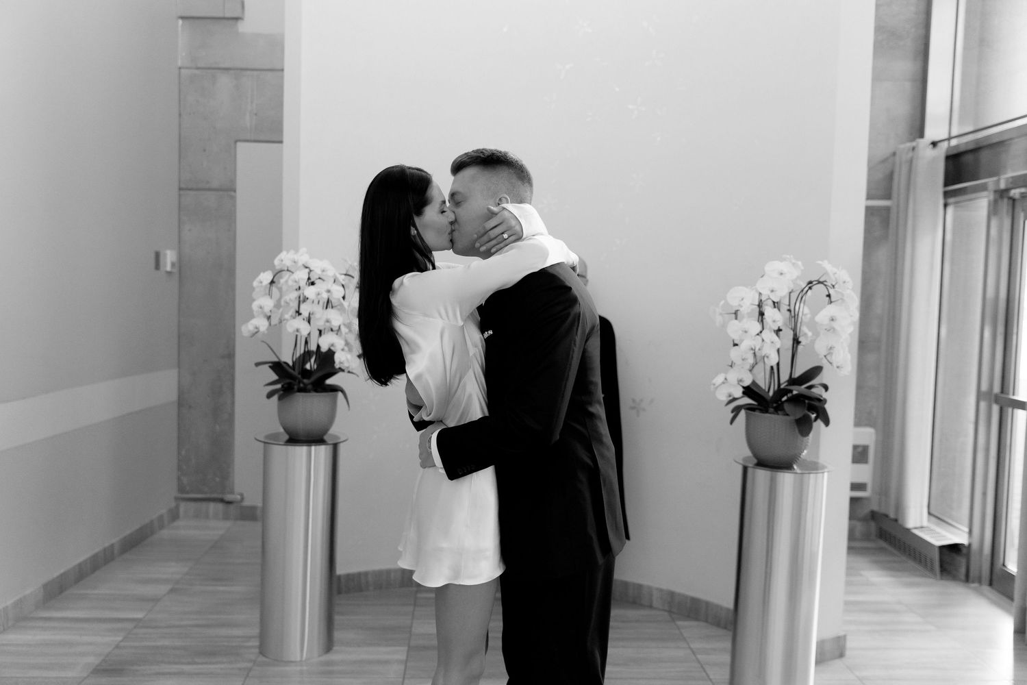 Vintage and editorial style civil wedding photos in Toronto, Ontario at Toronto City Hall. Canadian wedding photographer.