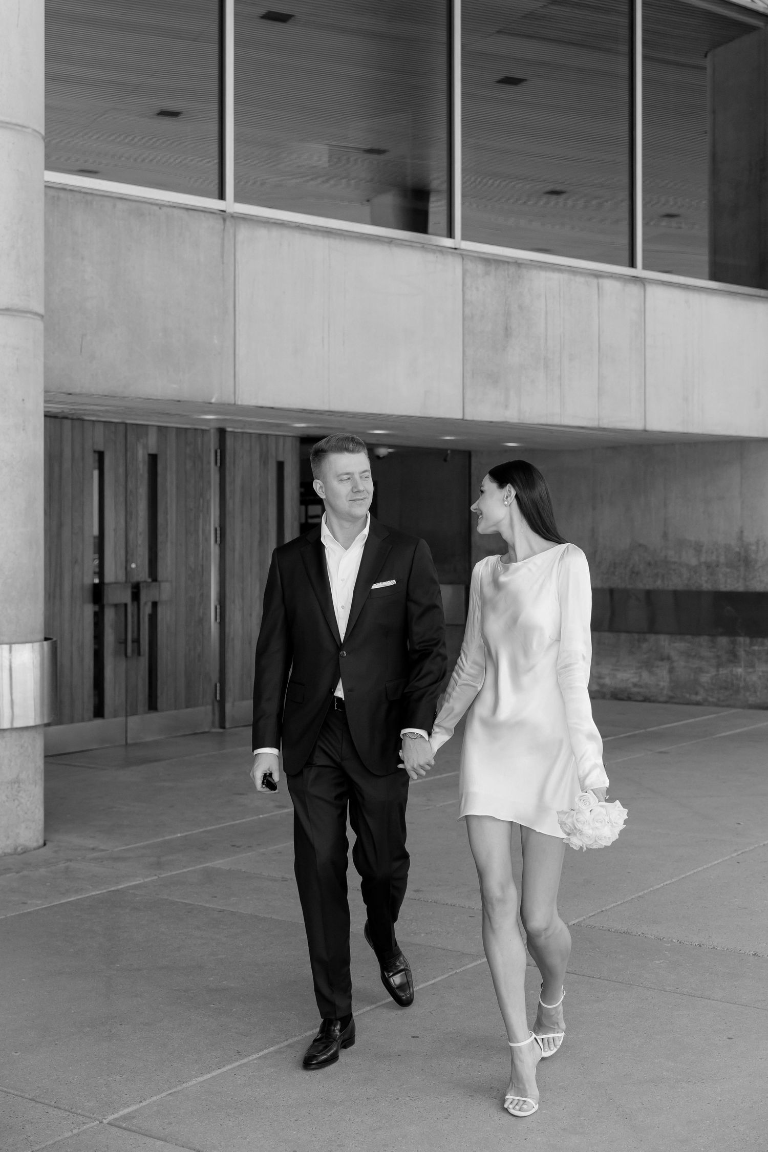 Vintage and editorial style civil wedding photos in Toronto, Ontario at Toronto City Hall. Canadian wedding photographer.