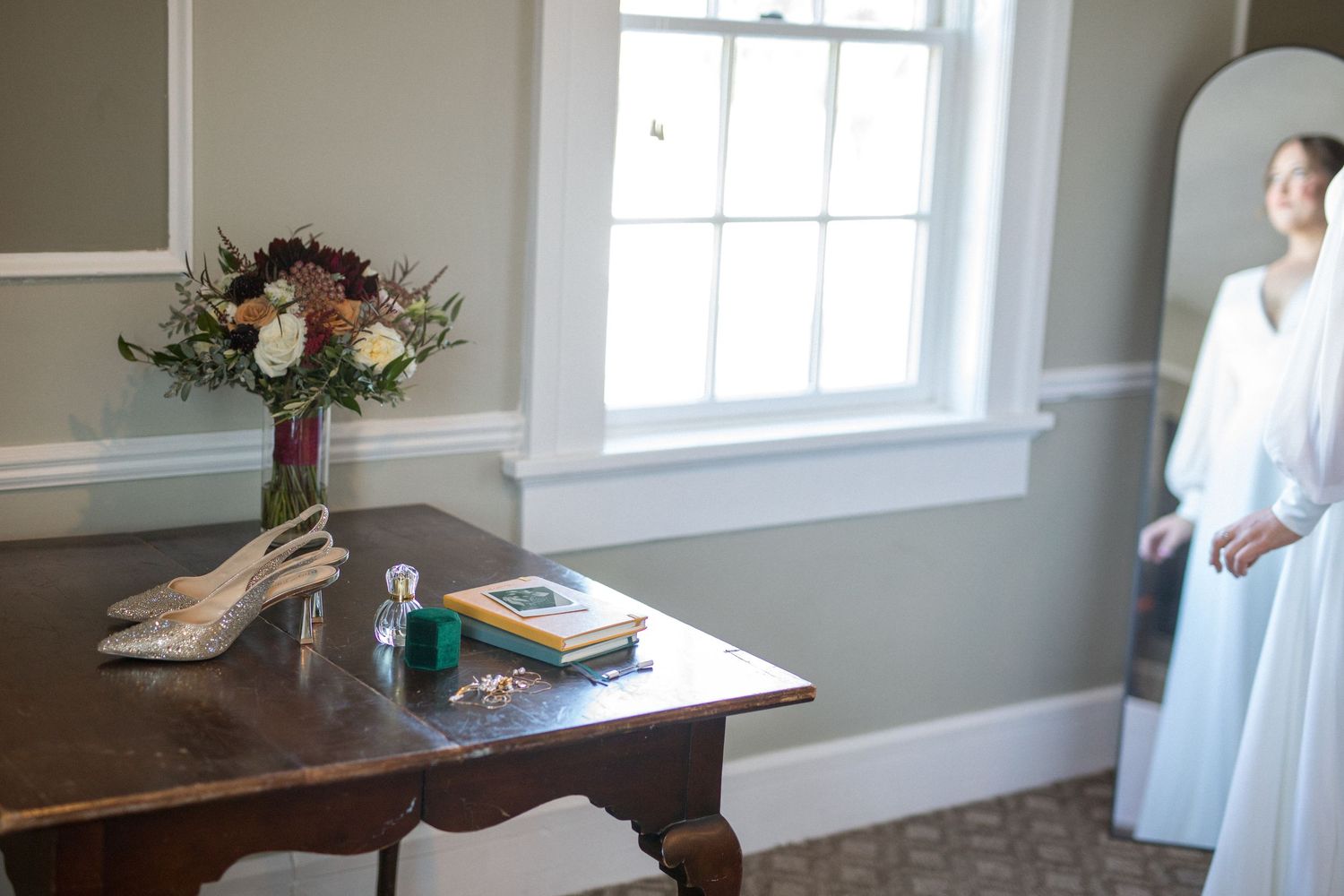 A series of connected photos showing a wedding dress preparation scene in a bright sunlit room with white decor.