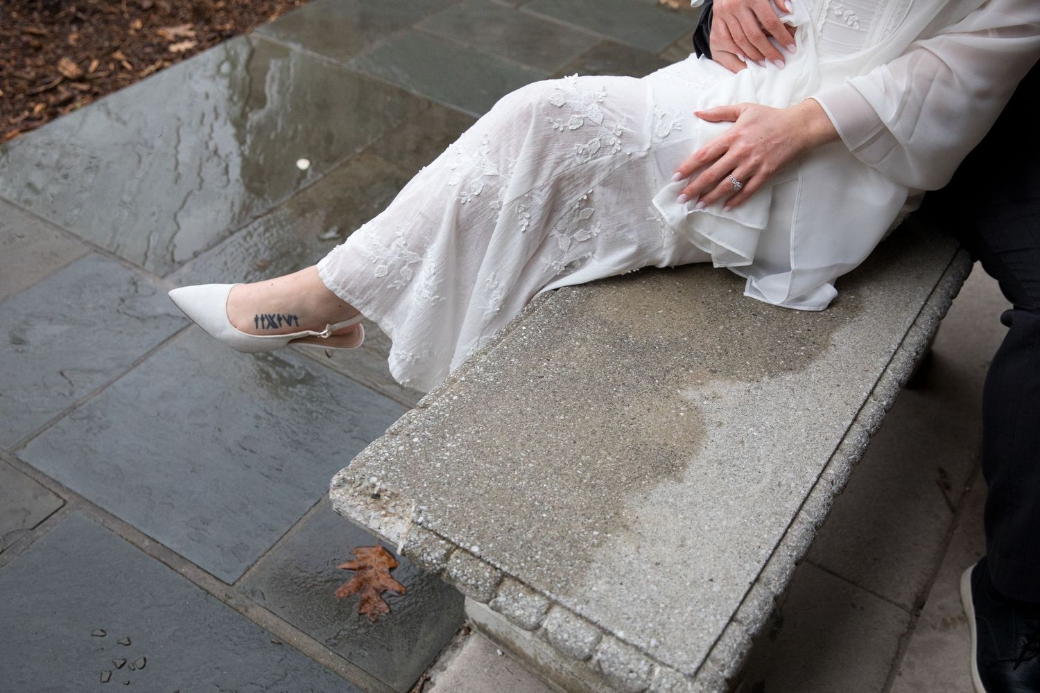 A sequence of images showing hands using a trowel to smooth and finish concrete on a stone surface.