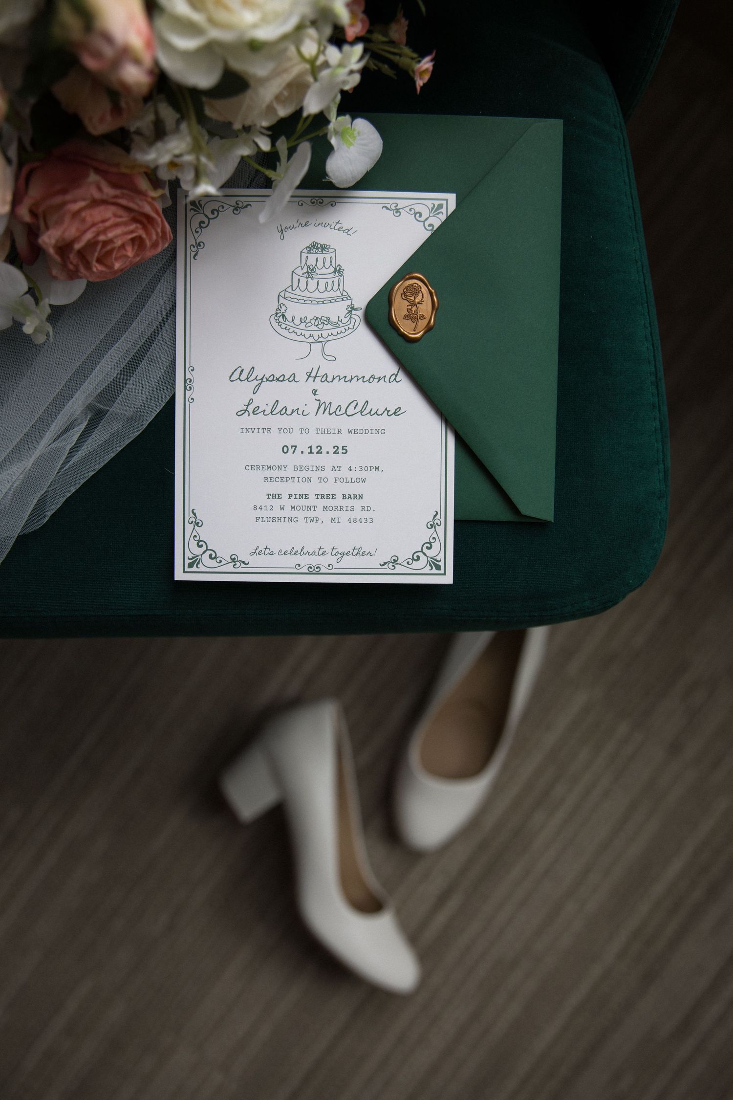 Wedding invitation with elegant calligraphy text displayed on dark green background with floral accents.