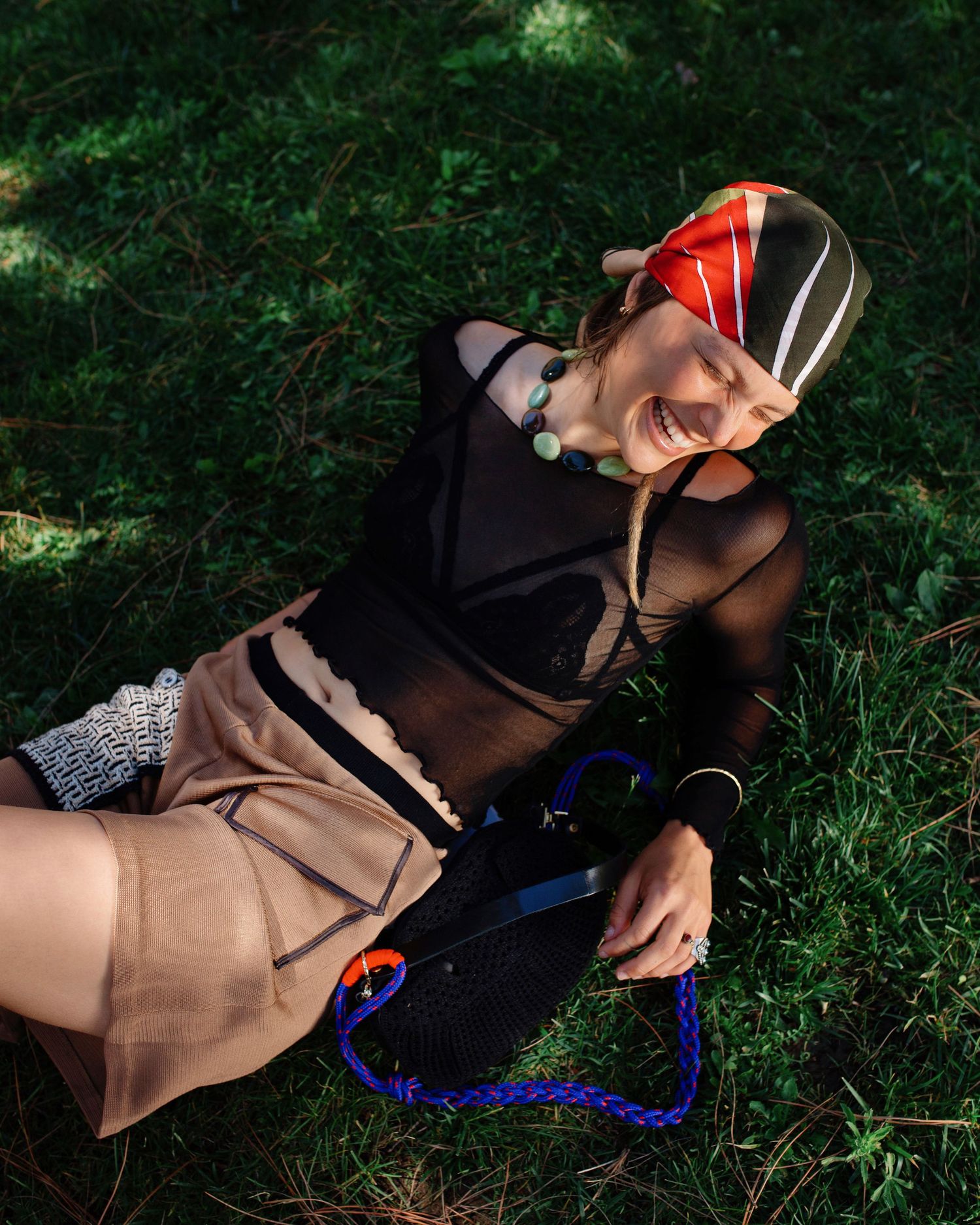 Photograph of a girl on grass. Photography by studio sale.