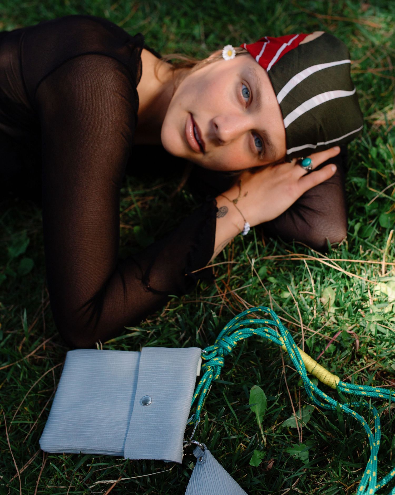 Photograph of a girl on grass. Photography by studio sale.