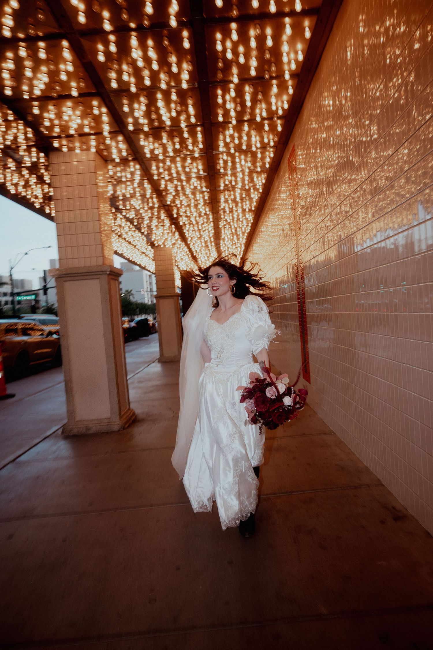 Bride running away fremont street