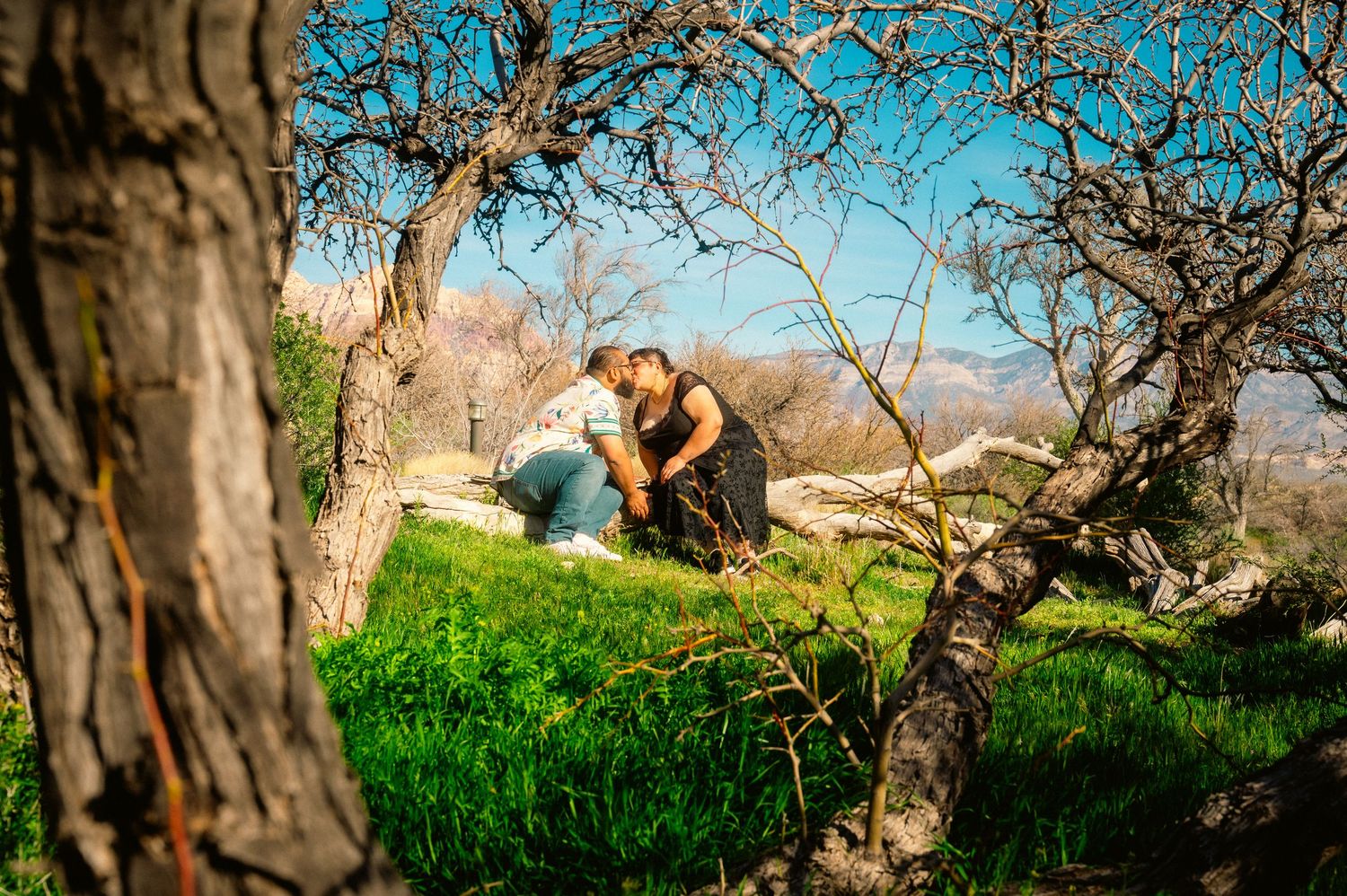A couple shares private vows with red rock canyon in the background