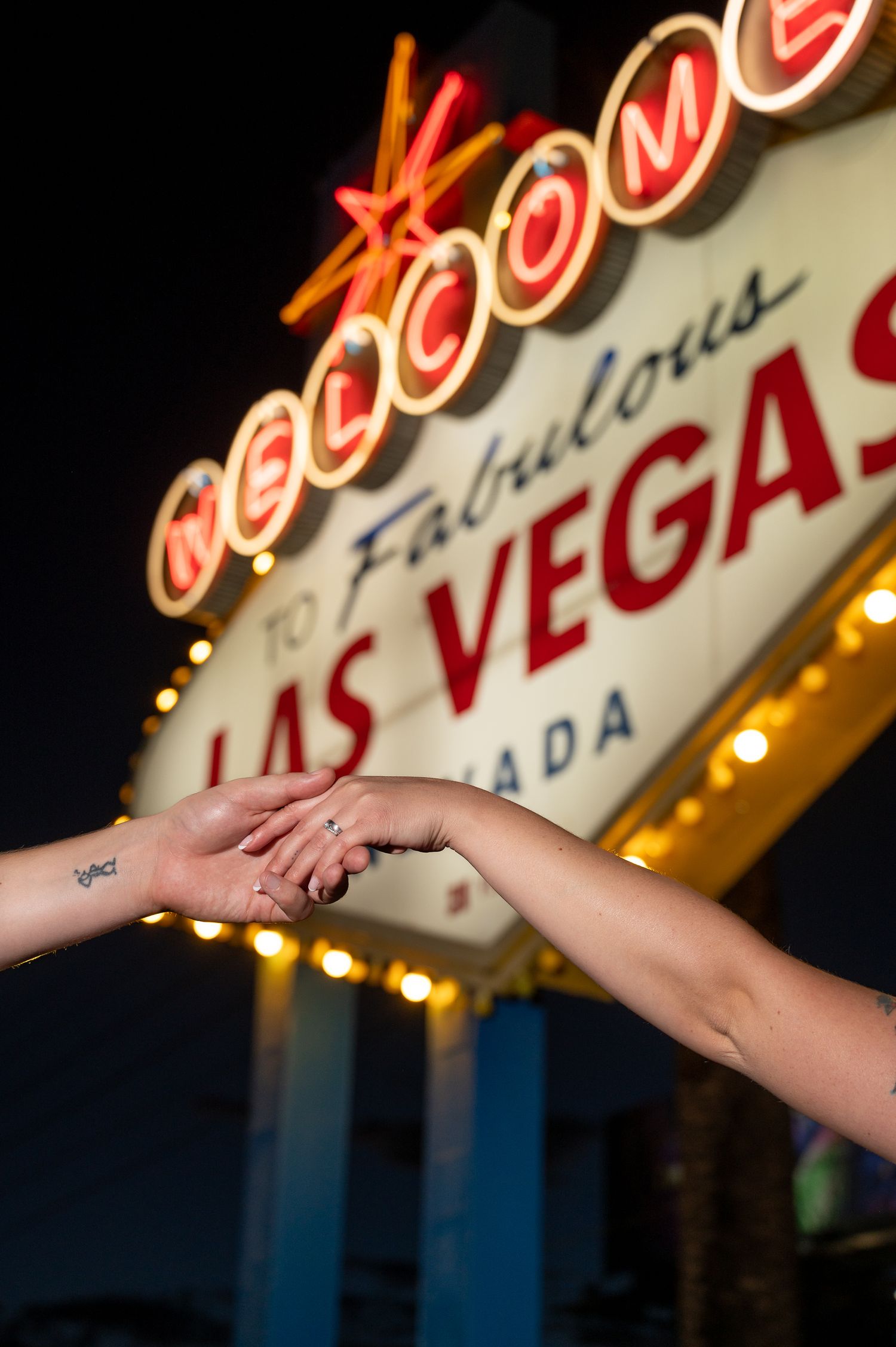 Lovers at the Las Vegas Sign