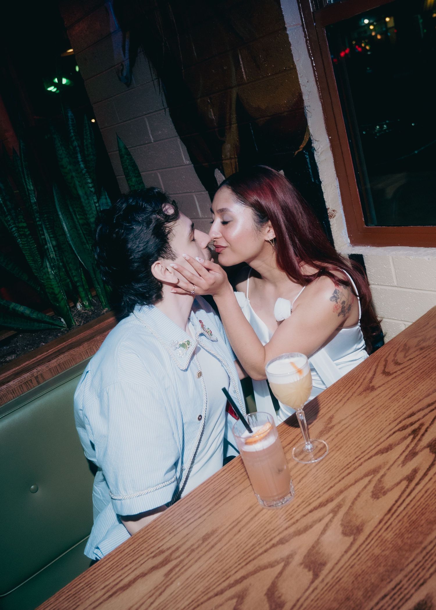 Romantic and editorial engagement photos in a vintage las vegas bar
