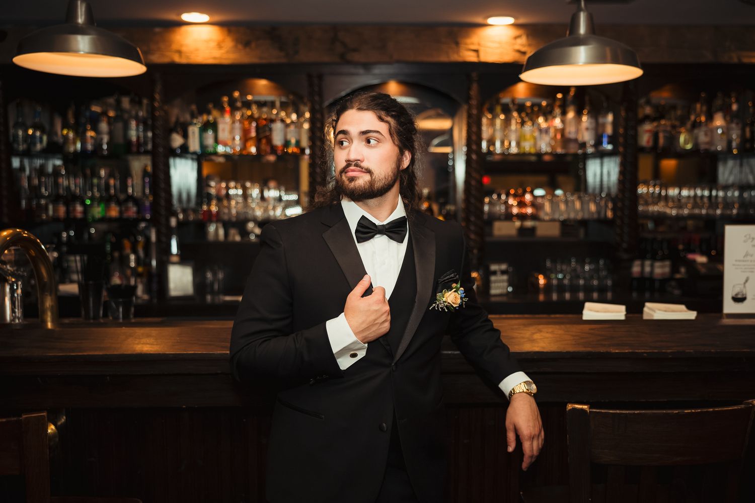 Moody bar interior with warm lighting and elegant decor creates intimate atmosphere.