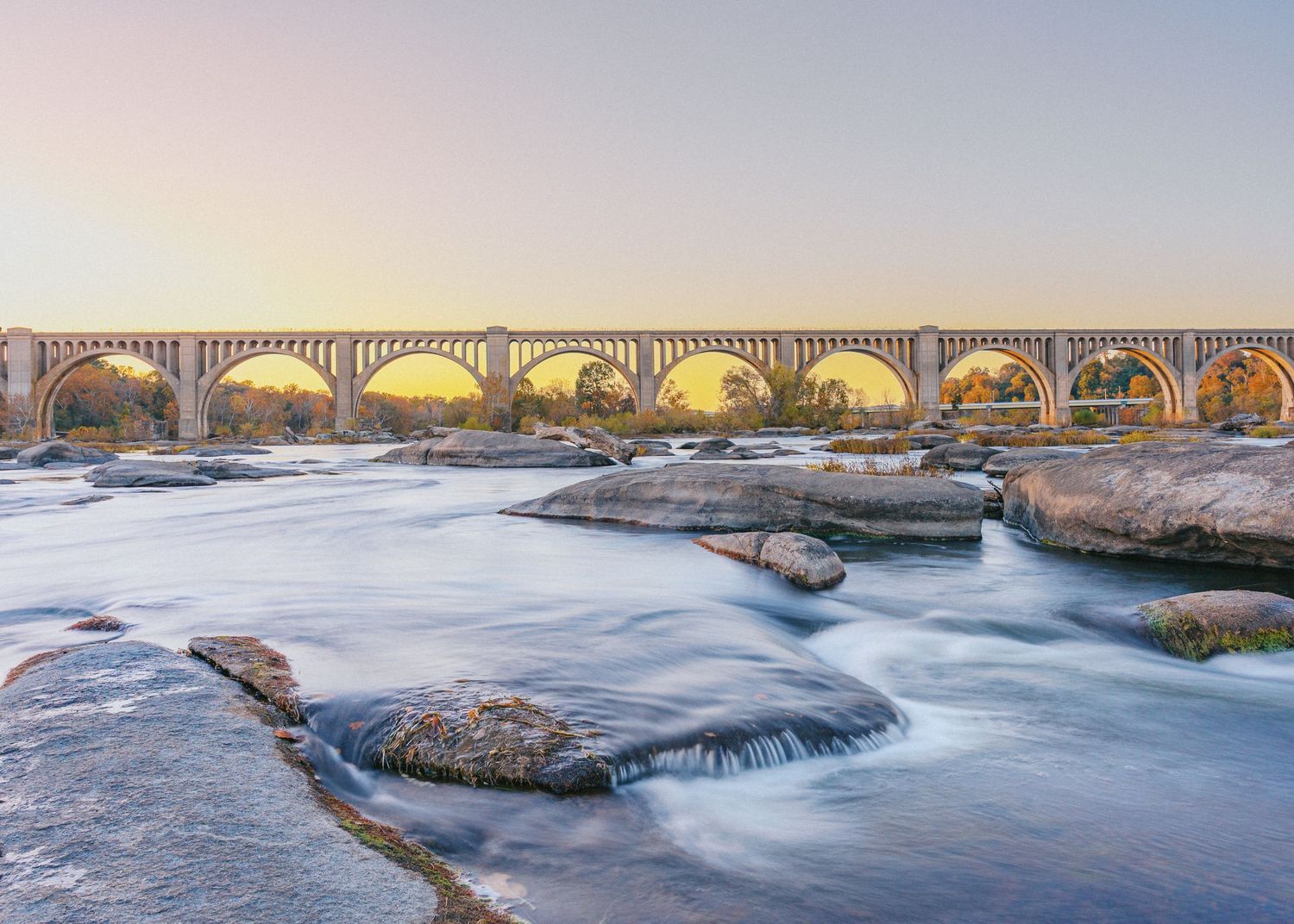 CSC A Line bridge over the James River at sunset in Richmond Virginia. Tourism and Brand Photography by Sean Mullican Photography.