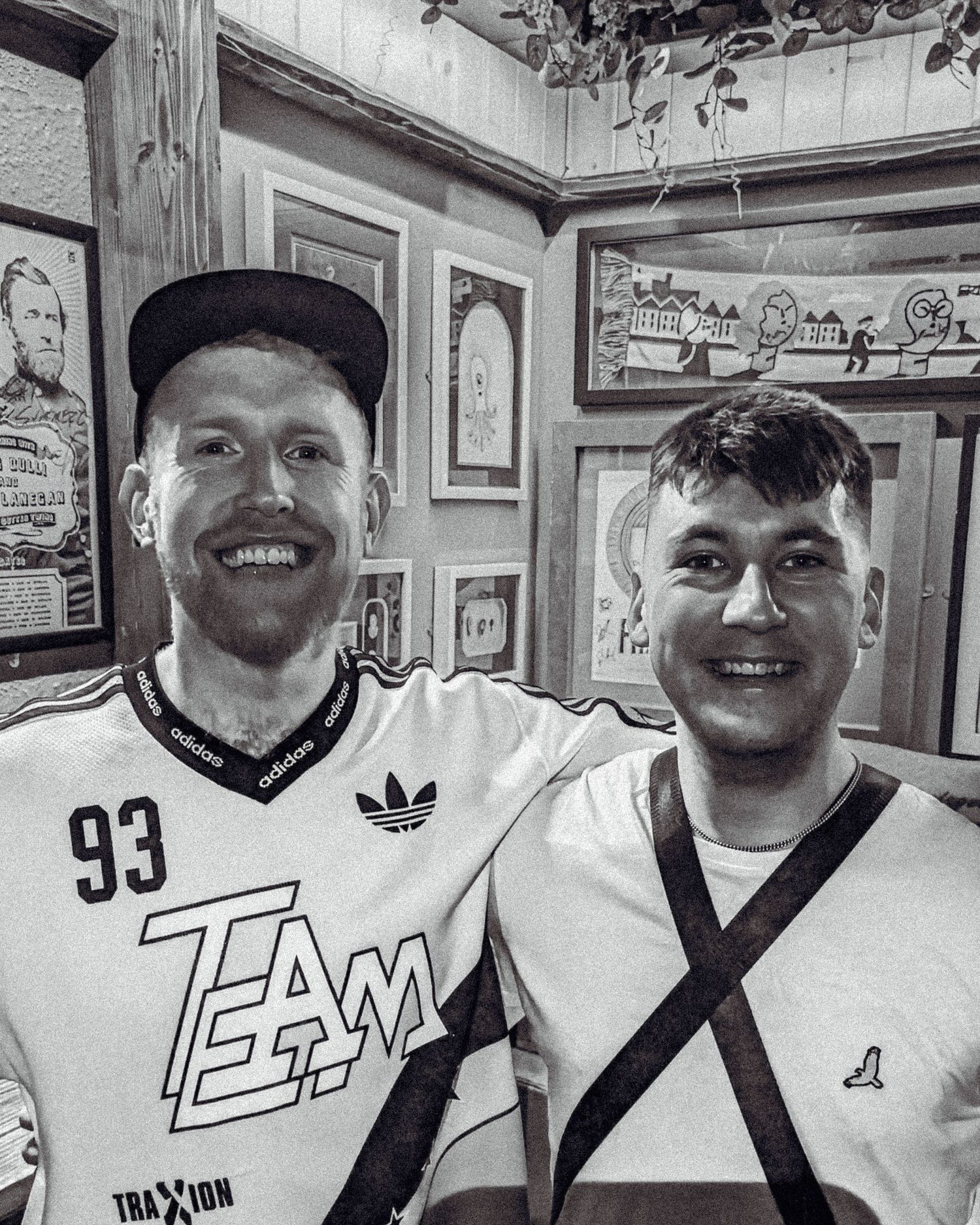 Black and white collage of smiling hockey players wearing jerseys and hats in a casual setting.