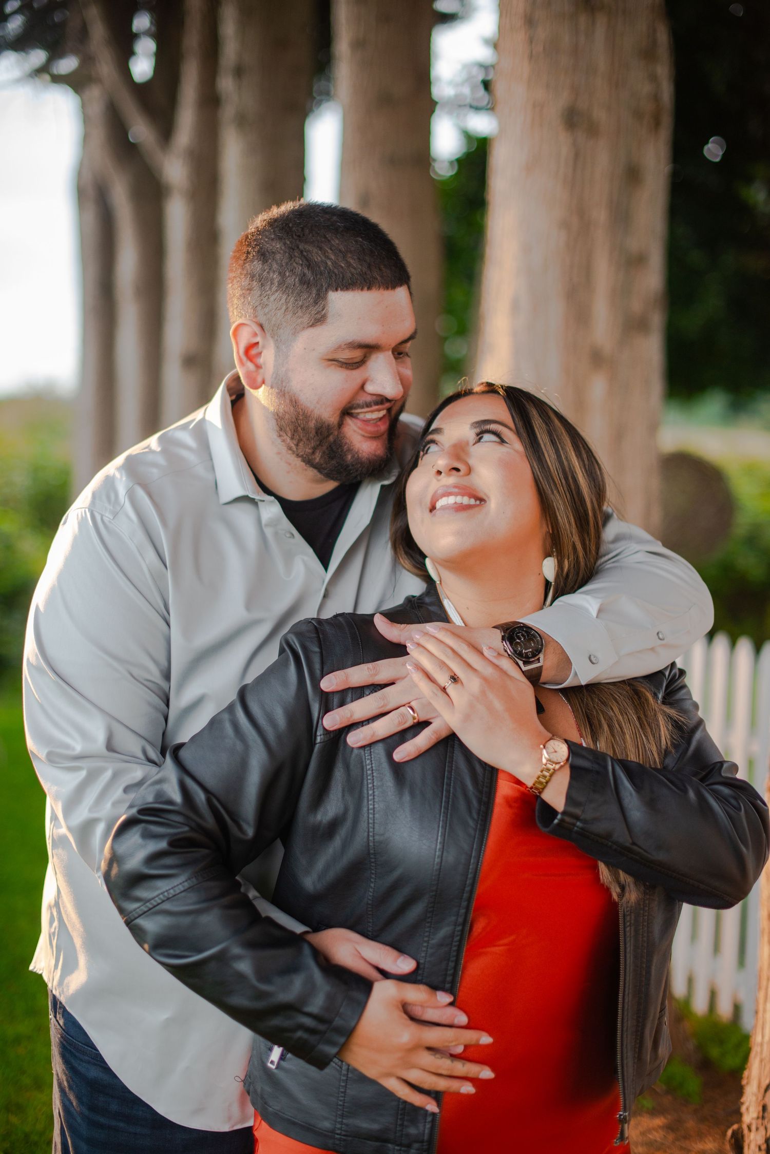 Romantic engagement photos taken under covered walkway with pillars. Knoxville Couple Photographer