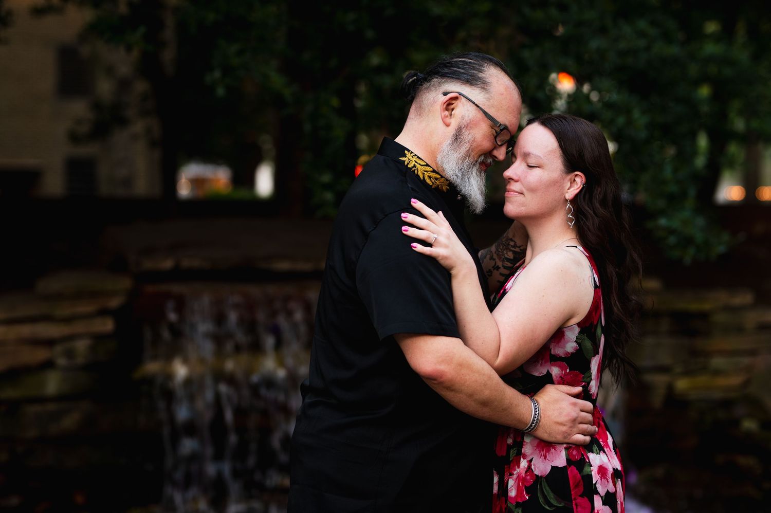 A tender moment captured between a couple during an outdoor photoshoot. Knoxville Couple Photographer