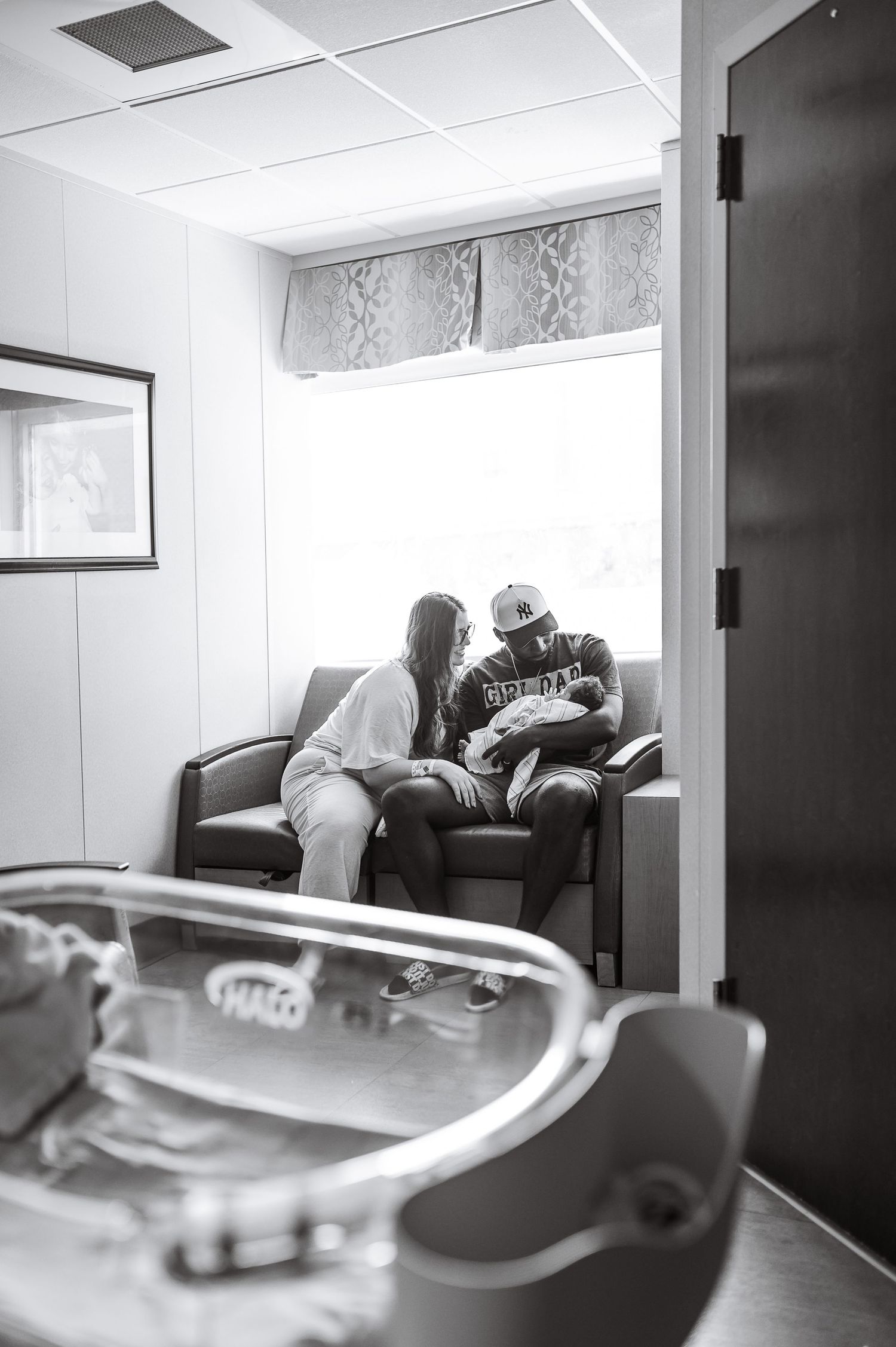 Hospital room interior with medical equipment and seating area. Knoxville Newborn Photographer UT Medical Center