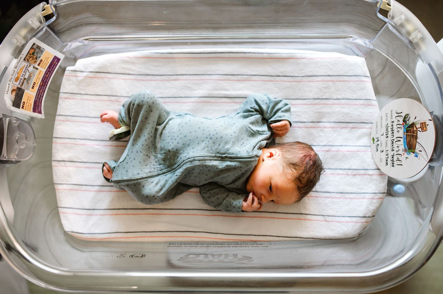 A series of photos showing a baby's growth progression while sleeping on a changing pad over several months. Knoxville Newborn Photographer