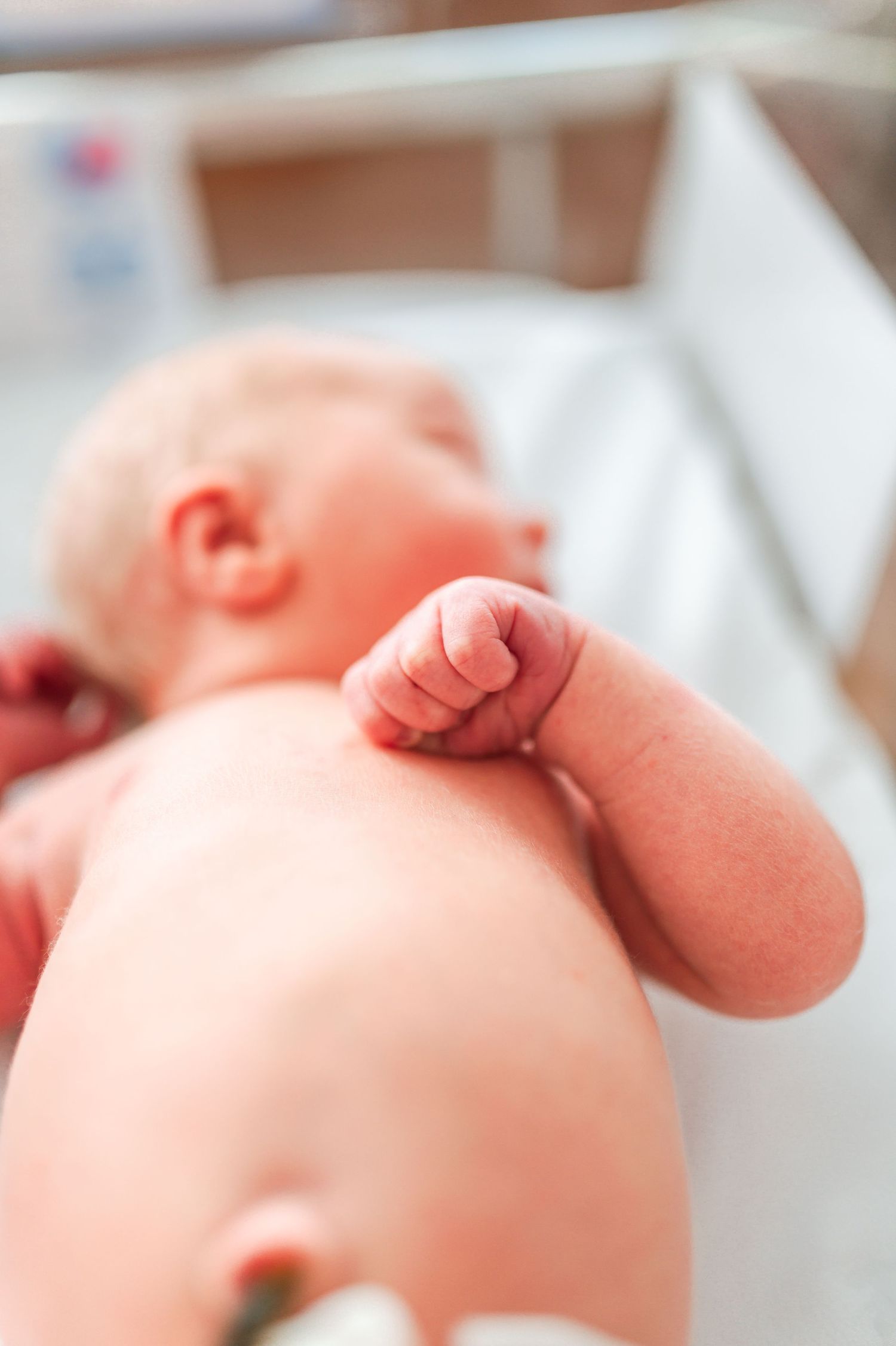 Close-up of tiny newborn toes and feet against white background. Knoxville Newborn Photographer UT Medical Center