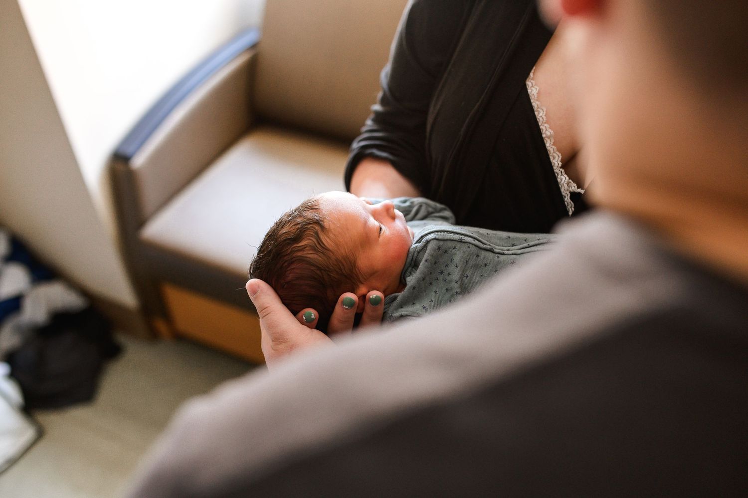 Interior view of a medical examination room with soft lighting. Knoxville Newborn Photographer UT Medical Center