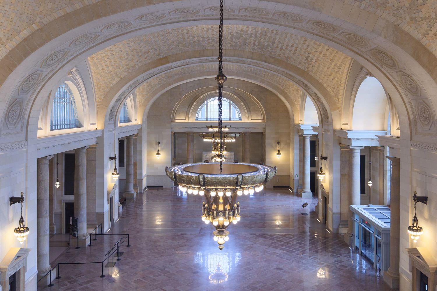 Ornate arched ceiling with hanging chandelier after the renovation in the historic Michigan Train Station in Detroit, Michigan.