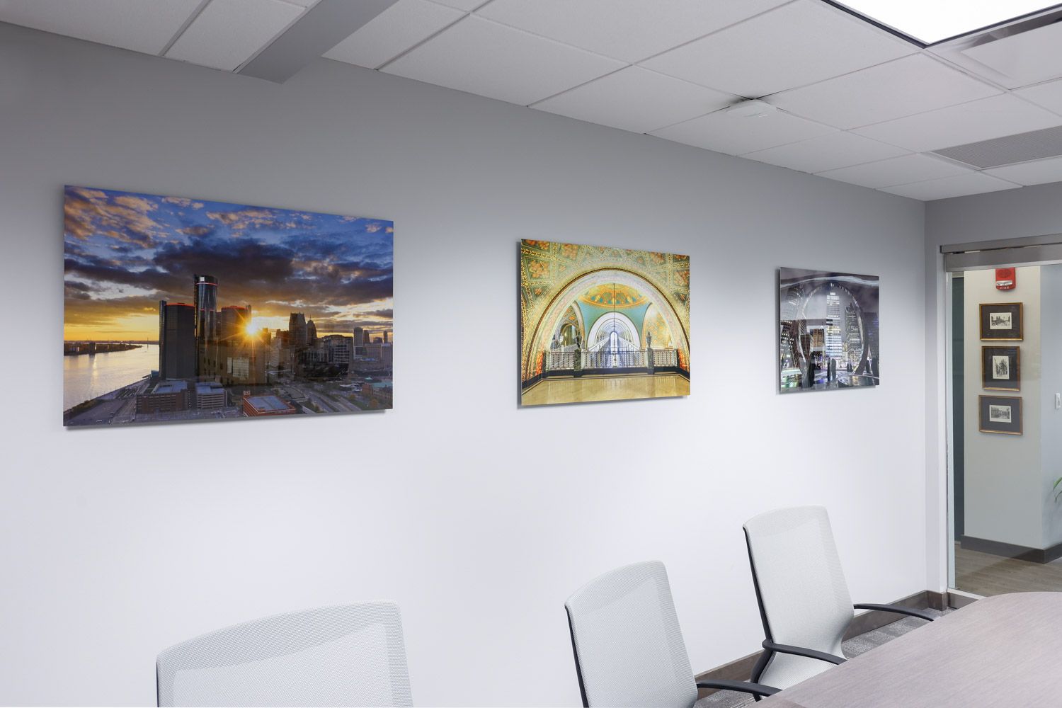 Bernard Wealth Management in Royal Oak conference room with photographs by Alanna St Laurent mounted on metal prints on the walls.