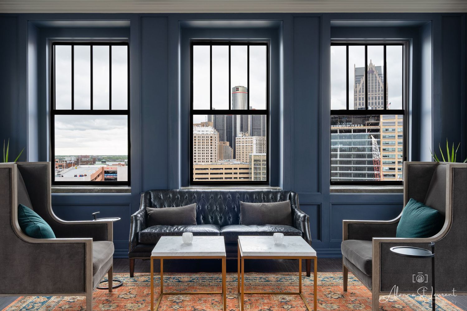 Modern lounge interior and dark walls inside the Monarch Club at the Element Hotel in downtown Detroit, Michigan.