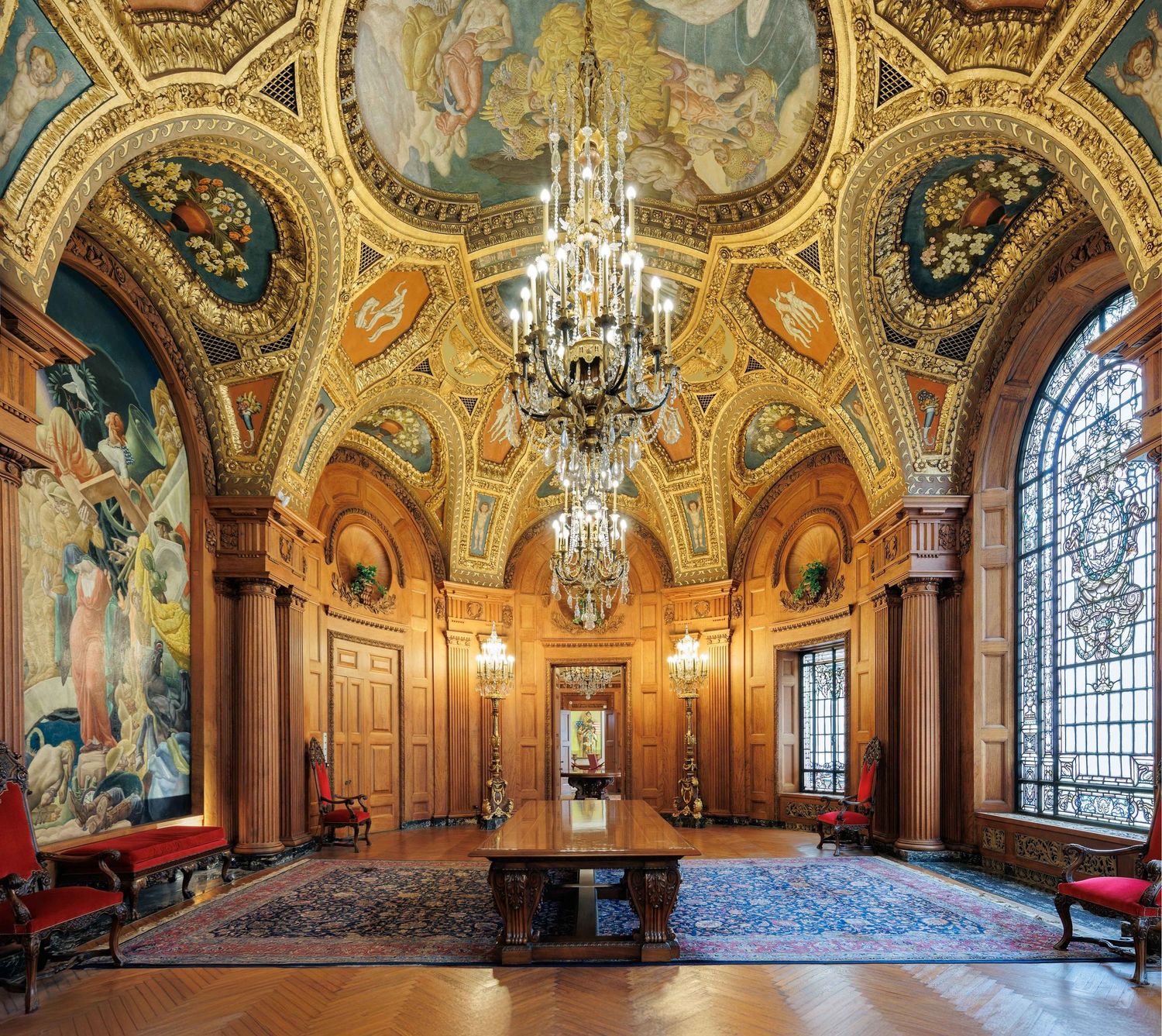 Ornate conference room with gilded ceiling murals and chandeliers at the Elks Memorial in Chicago, Illinois