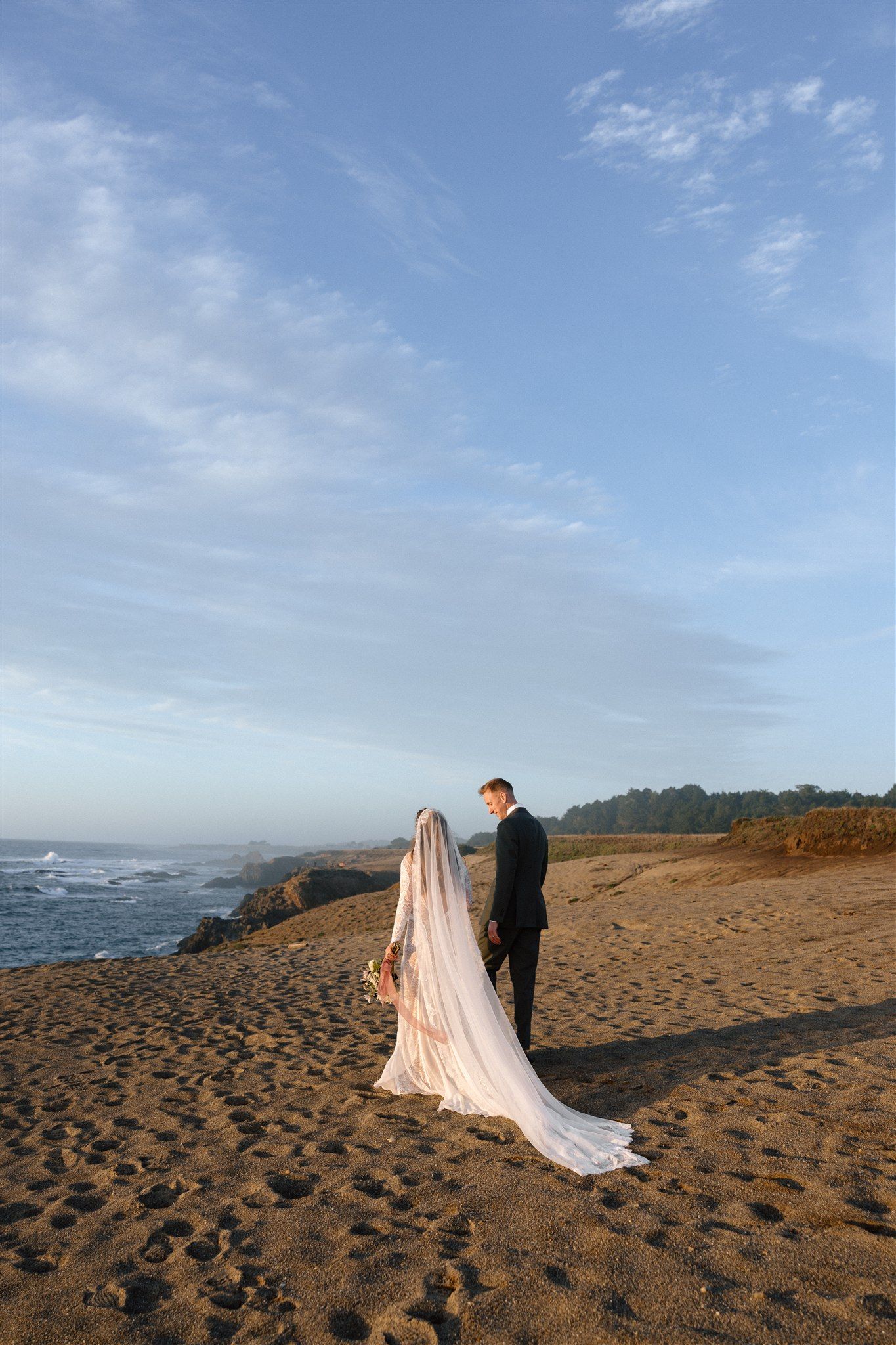 Wedding day golden hour portraits on coast at Spring Ranch in Mendocino, California, captured by Makayla Miranda Photo