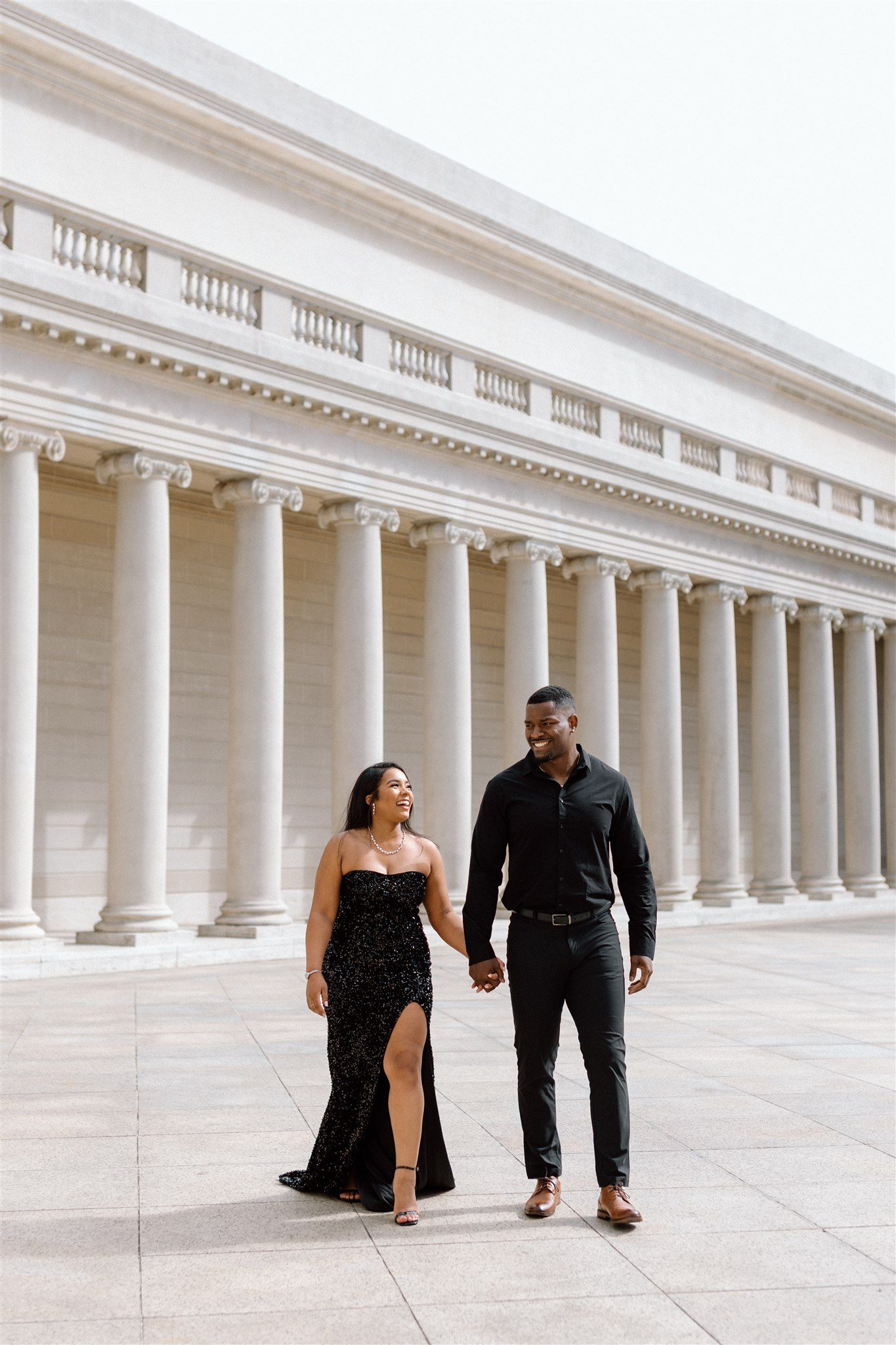 Couple posing for their engagement session at the Legion of Honor Museum in San Francisco, California, captured by Makayla Miranda Photo