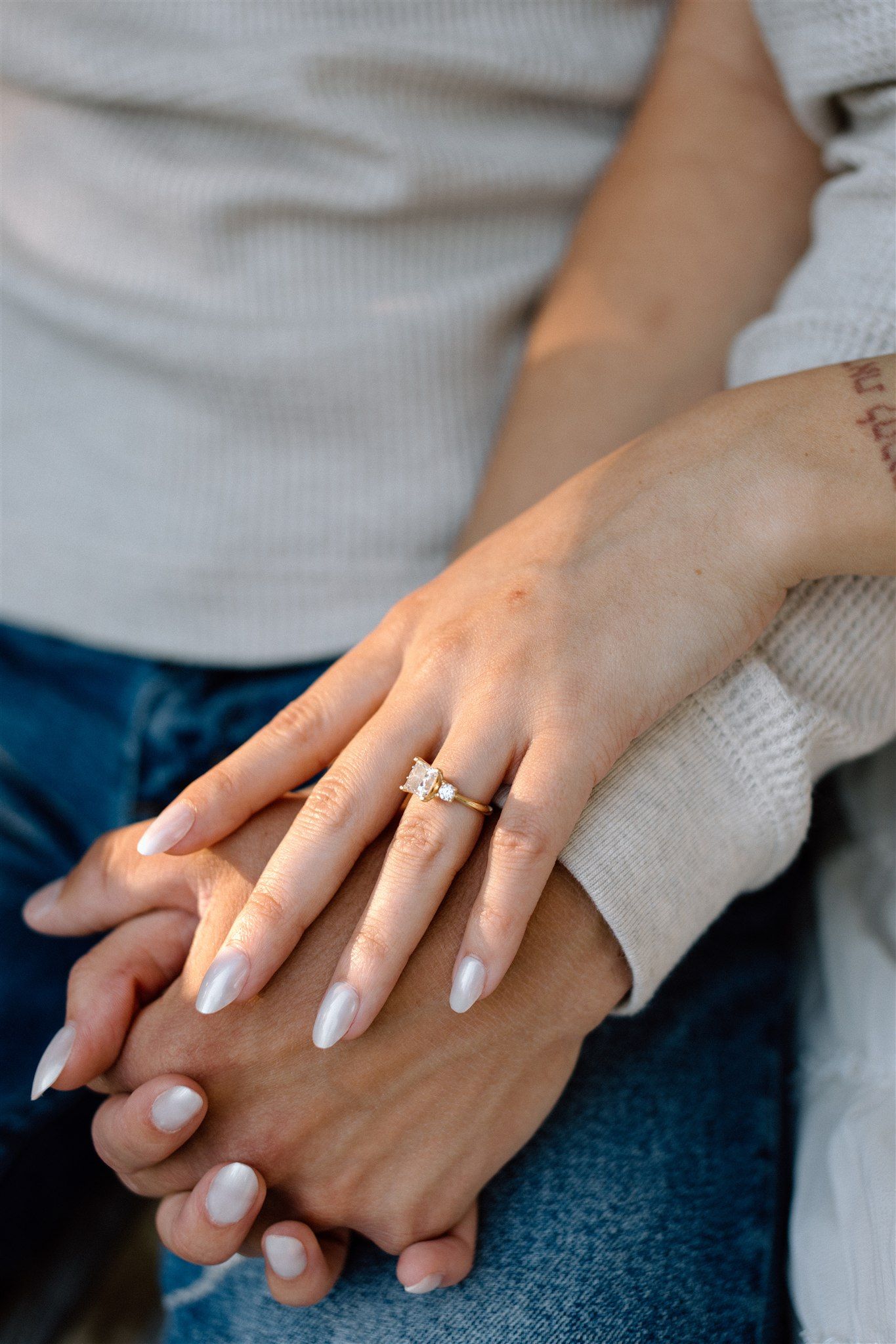 Close-up of an engagement ring on a hand during a Northern California engagement session, captured by Makayla Miranda Photo.