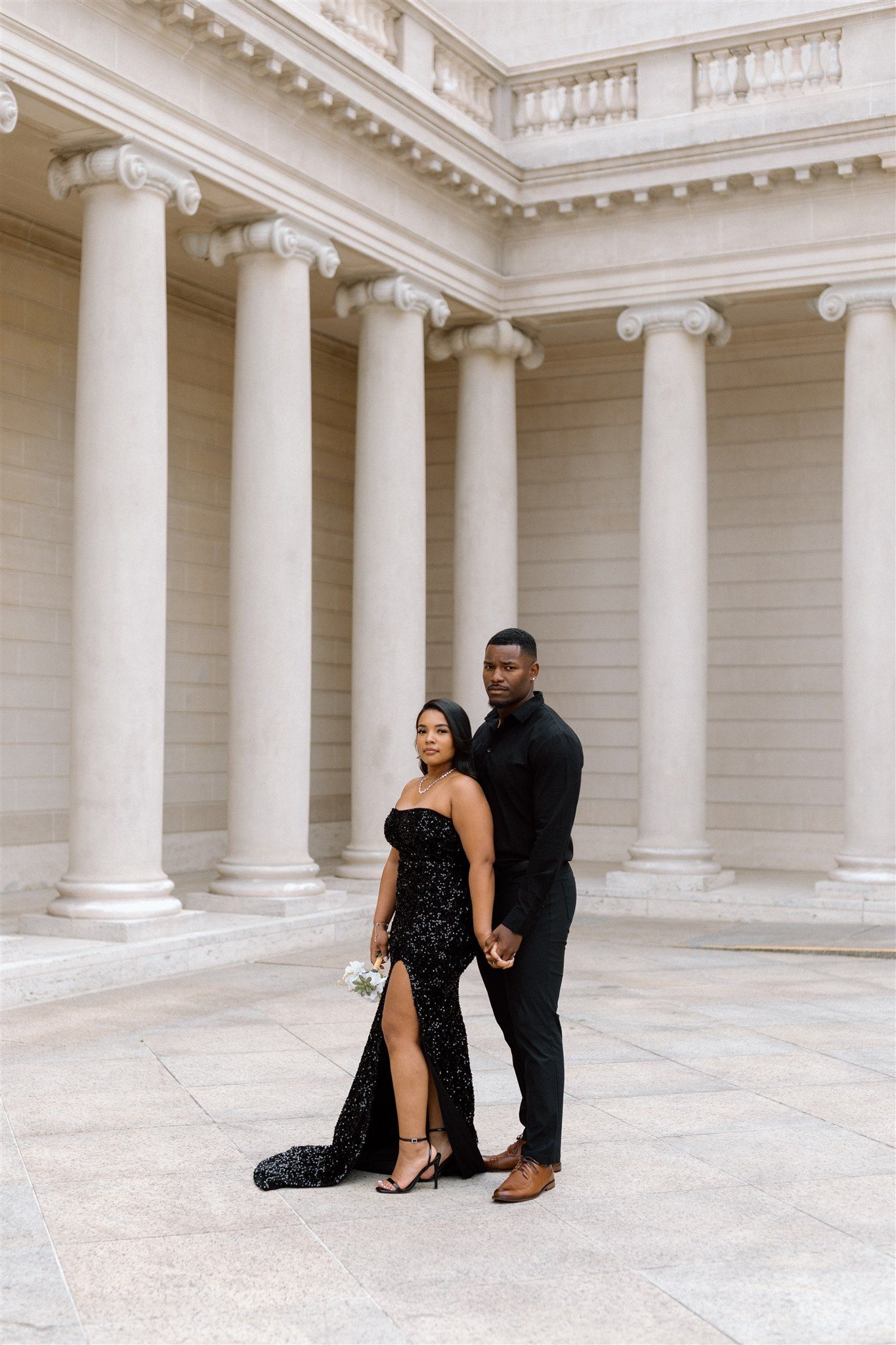 Couple posing for their engagement session at the Legion of Honor Museum in San Francisco, California, captured by Makayla Miranda Photo